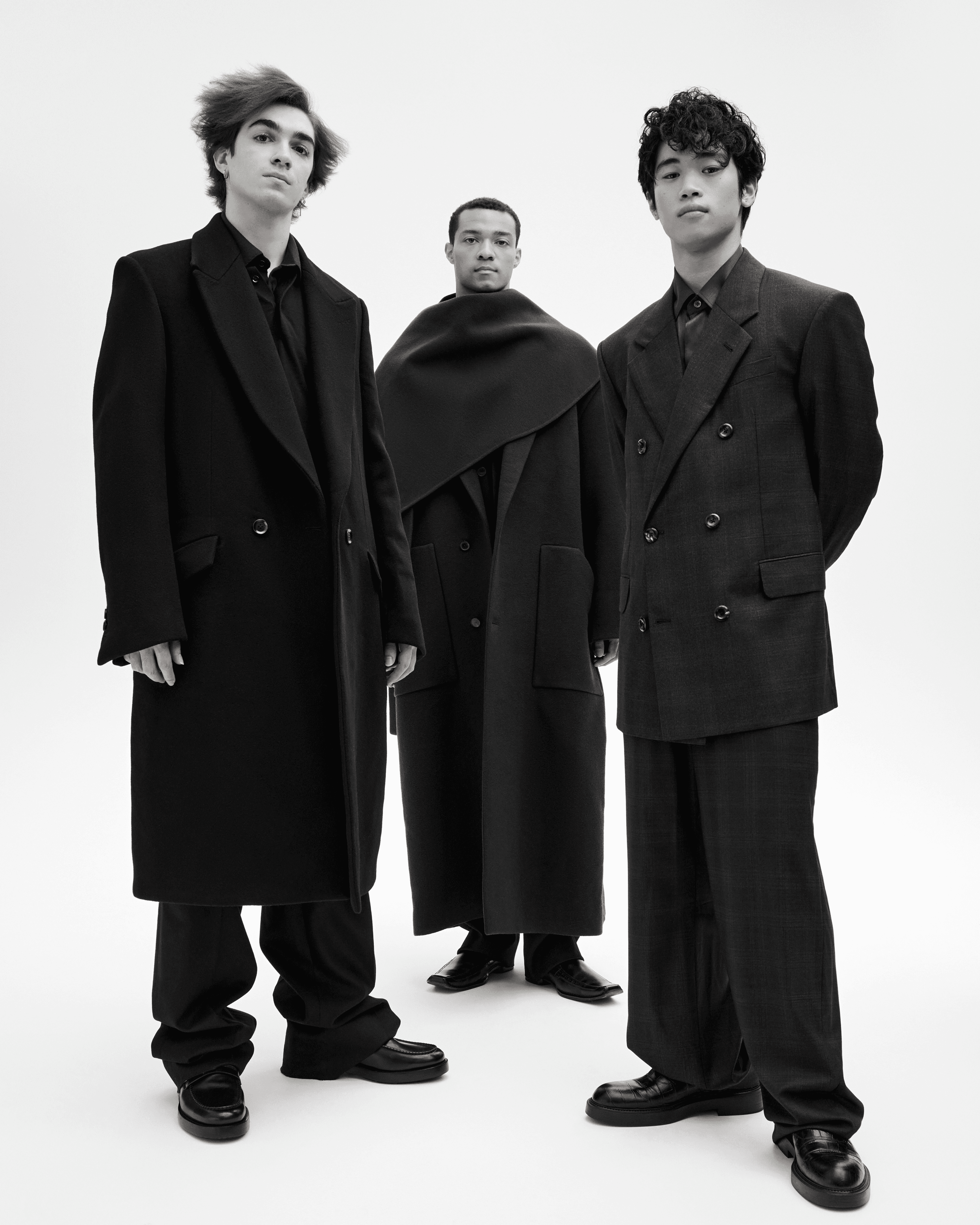 FROM LEFT: Gabriel wears all CLOTHING by Zegna; SHOES by Louis Vuitton. Chamblee wears all CLOTHING by Calvin Klein Collection; SHOES by Louis Vuitton. Takahashi wears all CLOTHING by Emporio Armani; SHOES by Louis Vuitton.