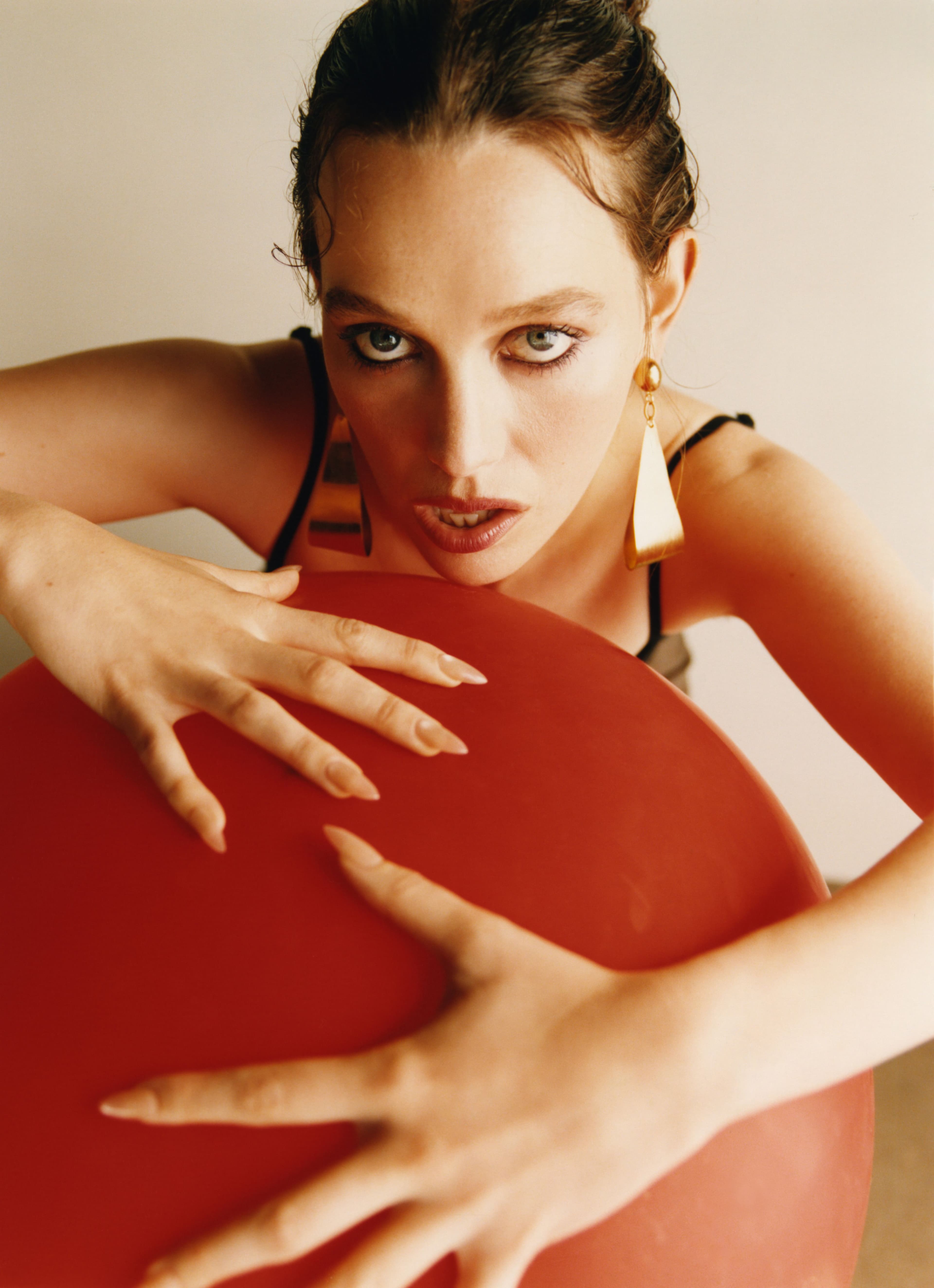 BODYSUIT by Beaufille; EARRINGS by Isabel Marant