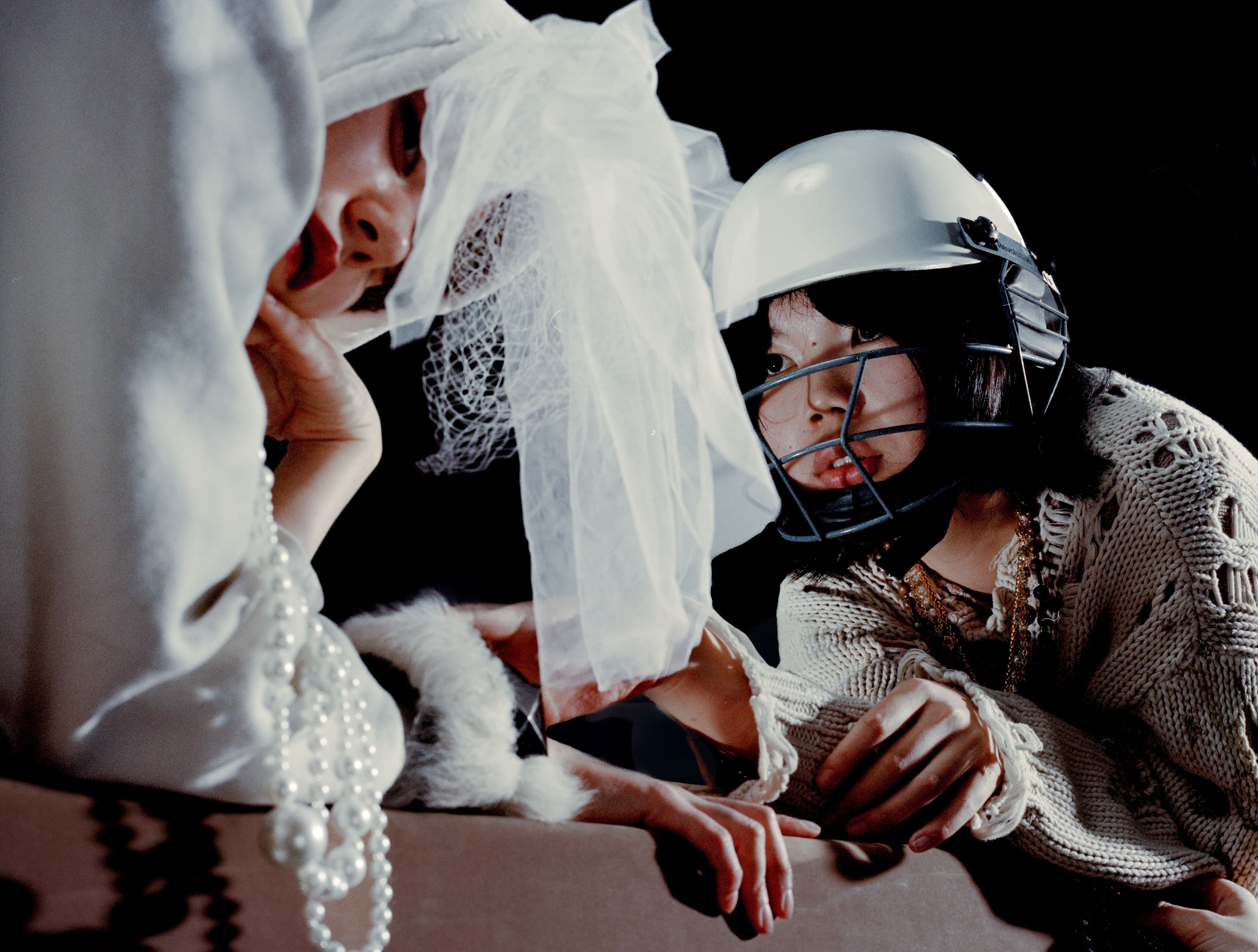 FROM LEFT: Aisha wears SWEATER, stylist’s own. BRACELETS by ,Skank Chic. ,Echo wears all CLOTHING, stylist’s own.