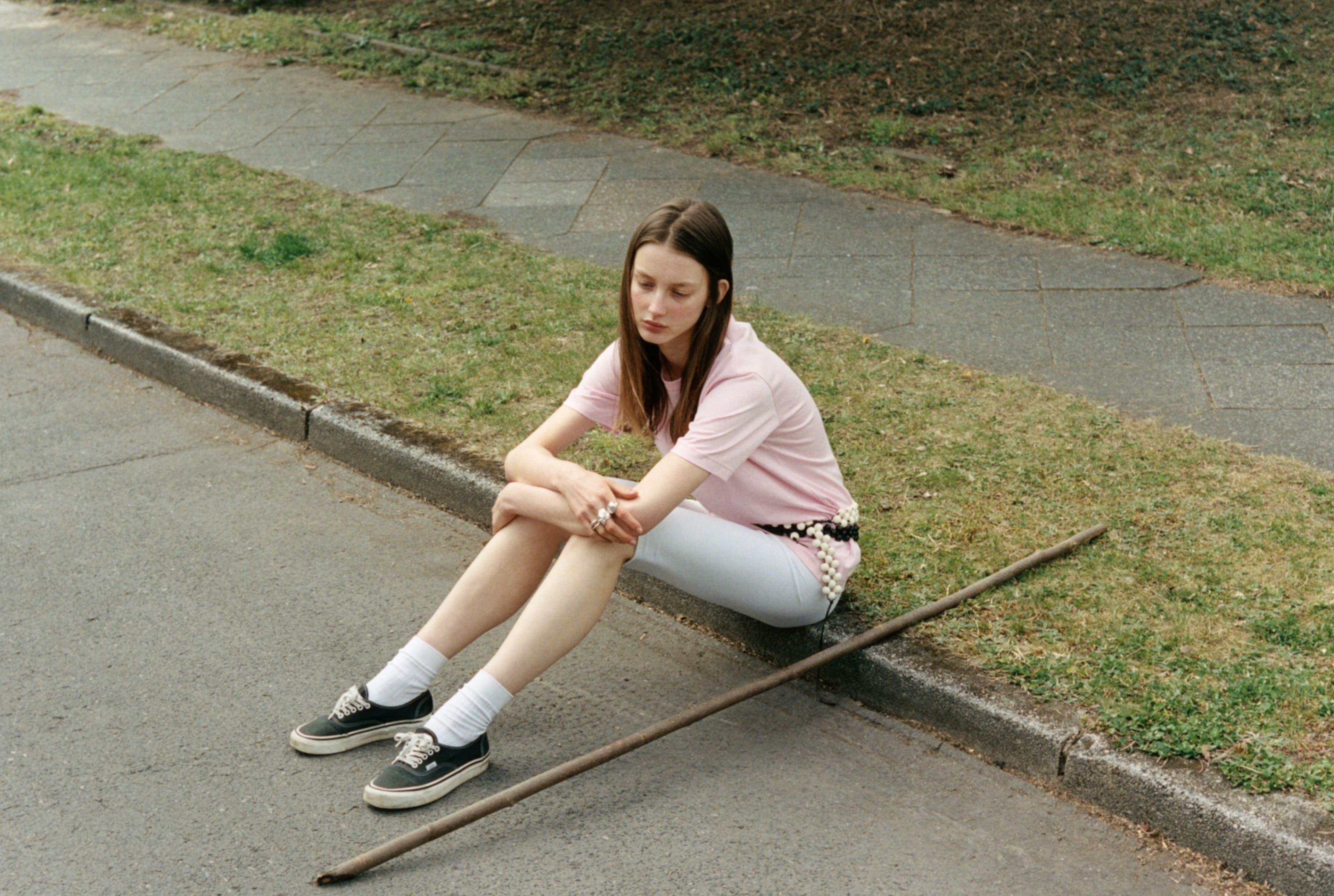 SHIRT by Comme des Garçons; vintage LEGGINGS, stylist’s own; BELTS by PRUM; SHOES by Vans; RINGS by Asereje