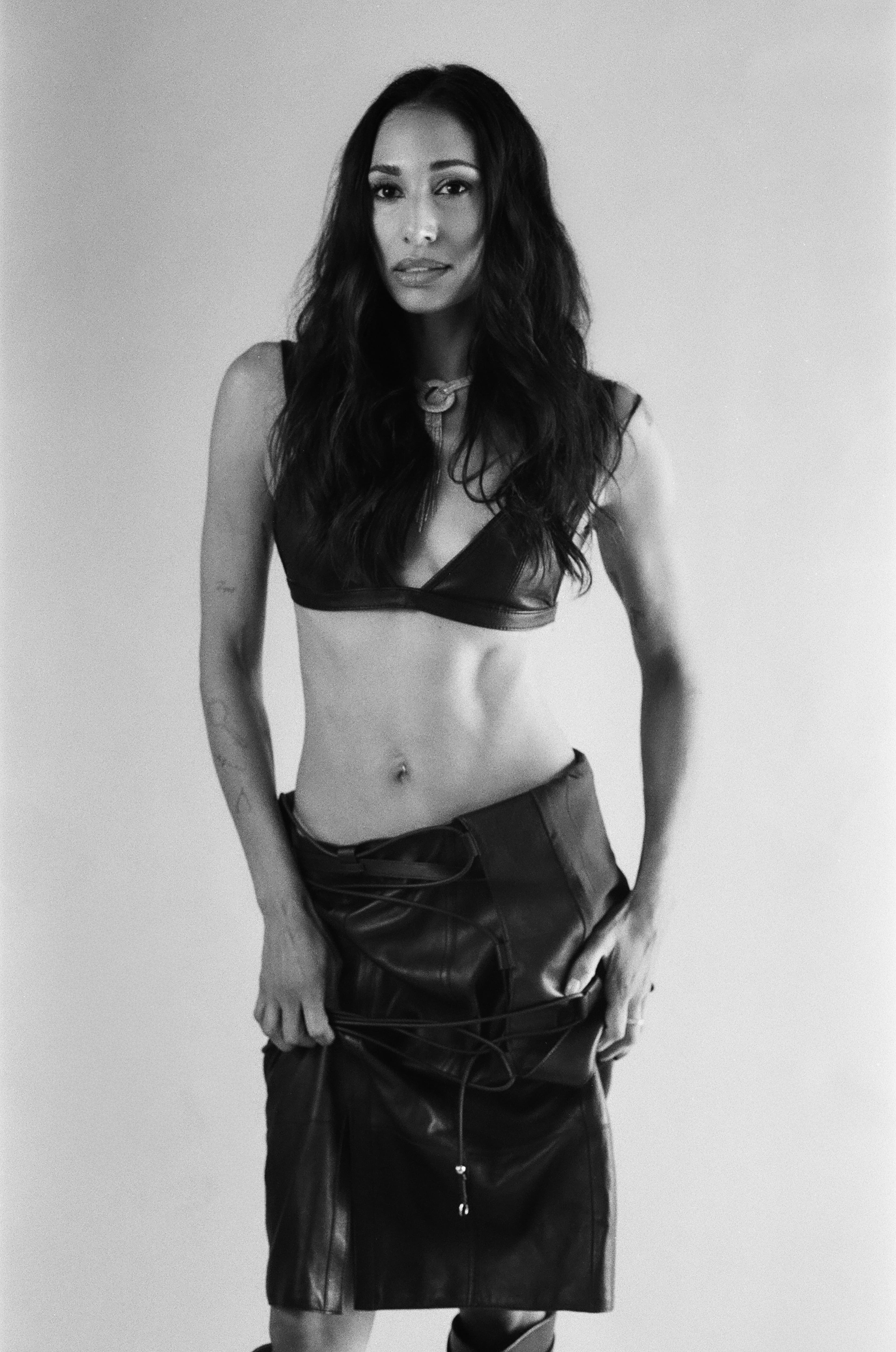 All CLOTHING by Hermès; all JEWELRY by Shay Jewelry