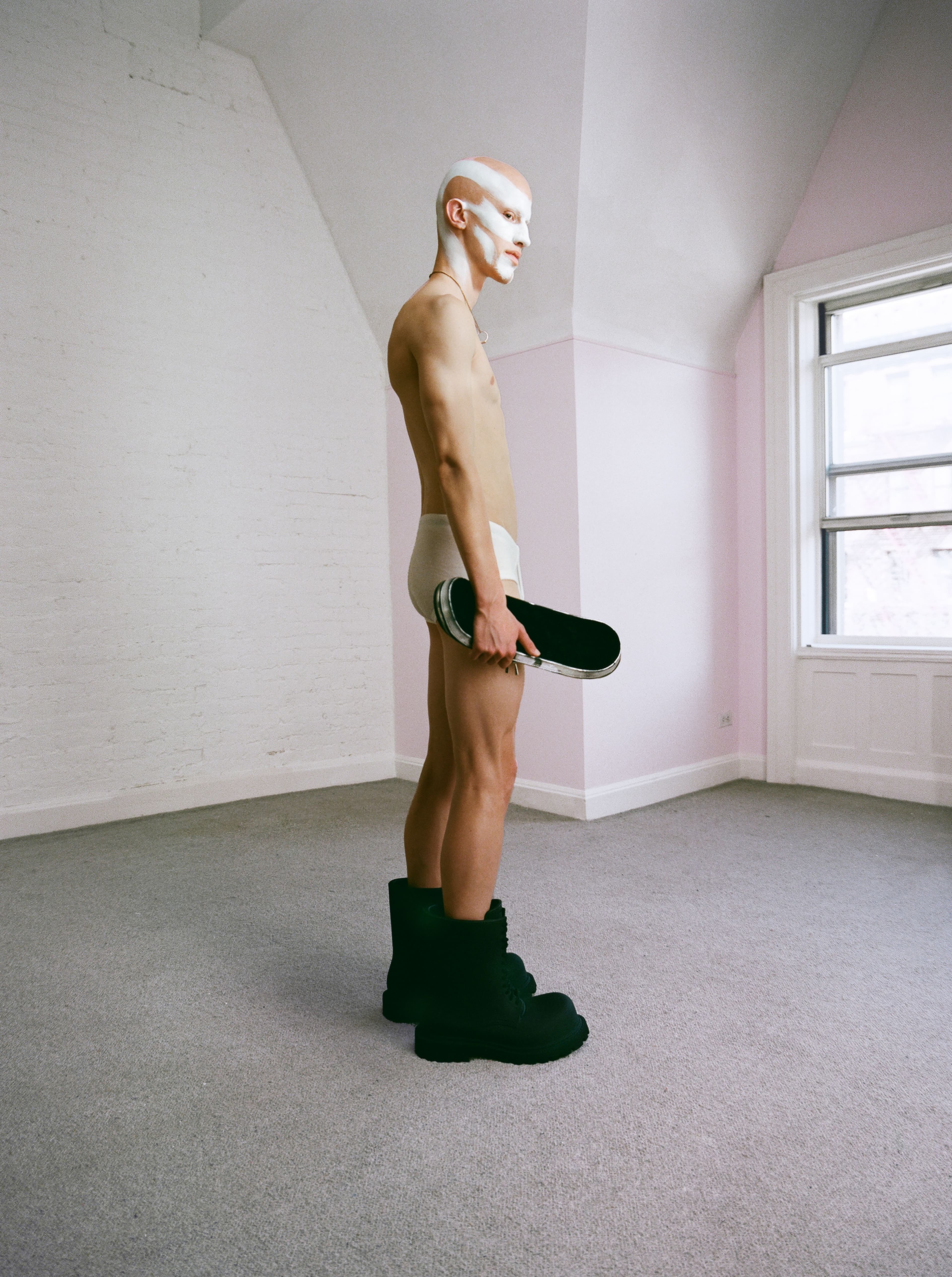 Underwear by Calvin Klein Underwear. Bag by Ratio. Boots by Balenciaga. All jewelry, Sobrado’s own..