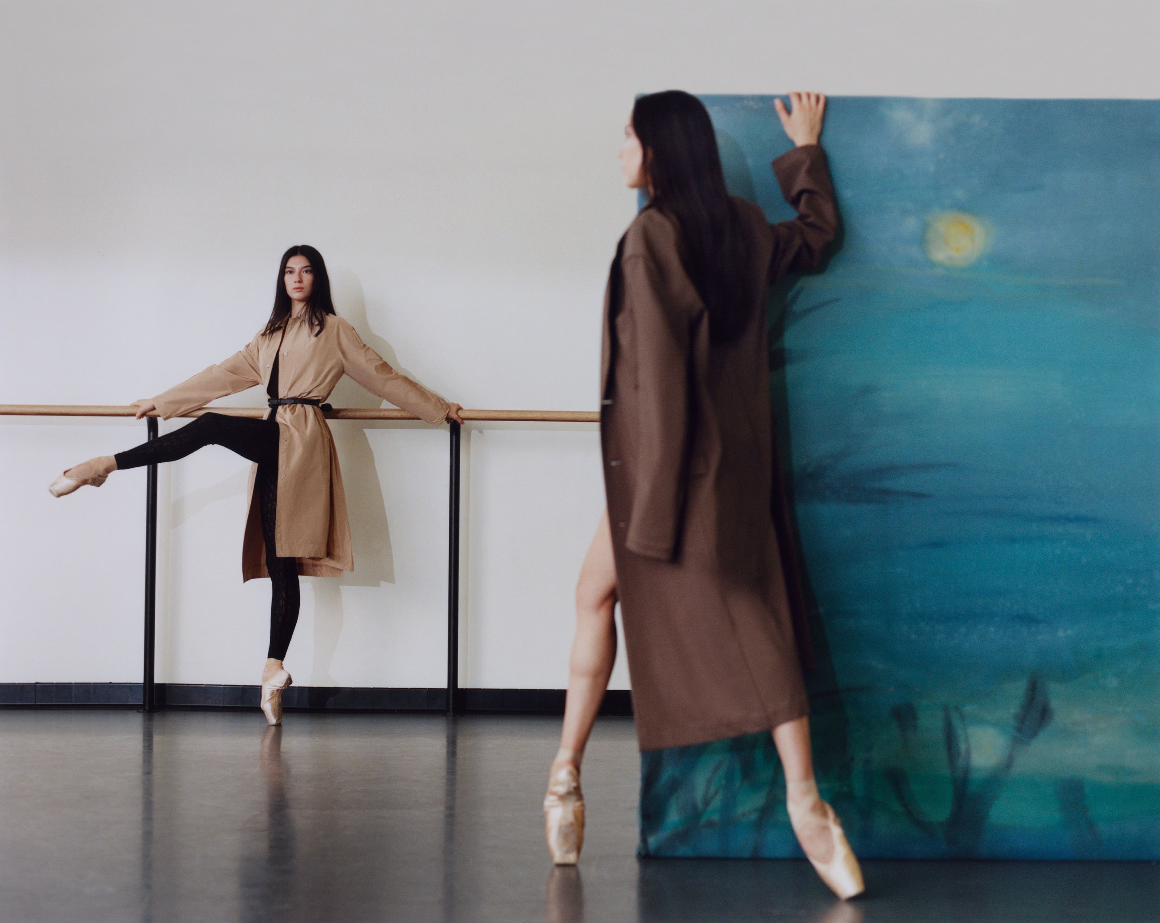 FROM LEFT: Misseldine wears COAT by Leset; BODYSUIT by Ely Ely; BELT, stylist’s own. Nadon wears COAT by Issey Miyake.
