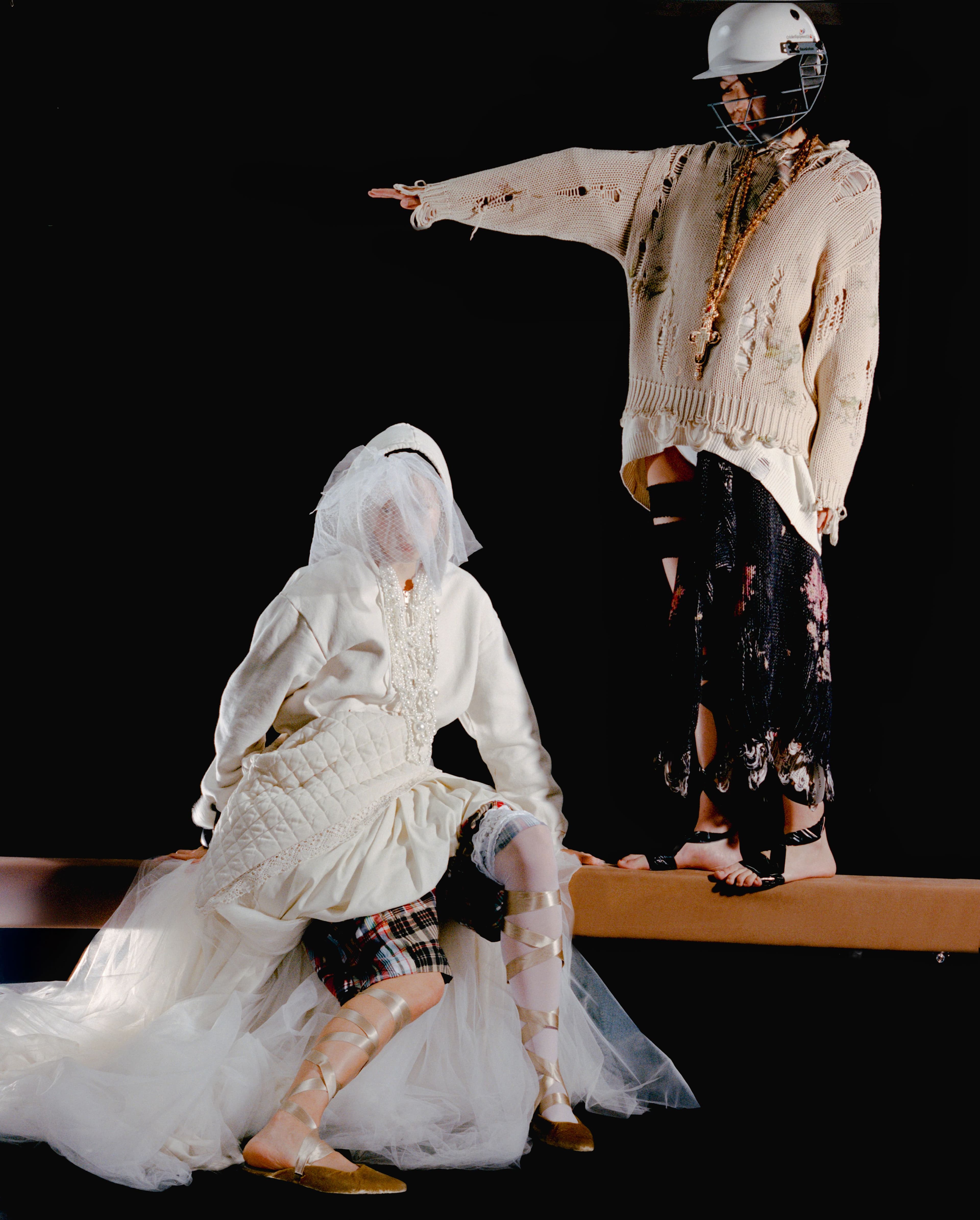 FROM LEFT: Aisha wears SWEATER, SHORTS, and SHOES, stylist’s own. SKIRT by ,Miss Claire Sullivan. ,BANGLES by ,Skank Chic. ,Echo wears all CLOTHING, stylist’s own.