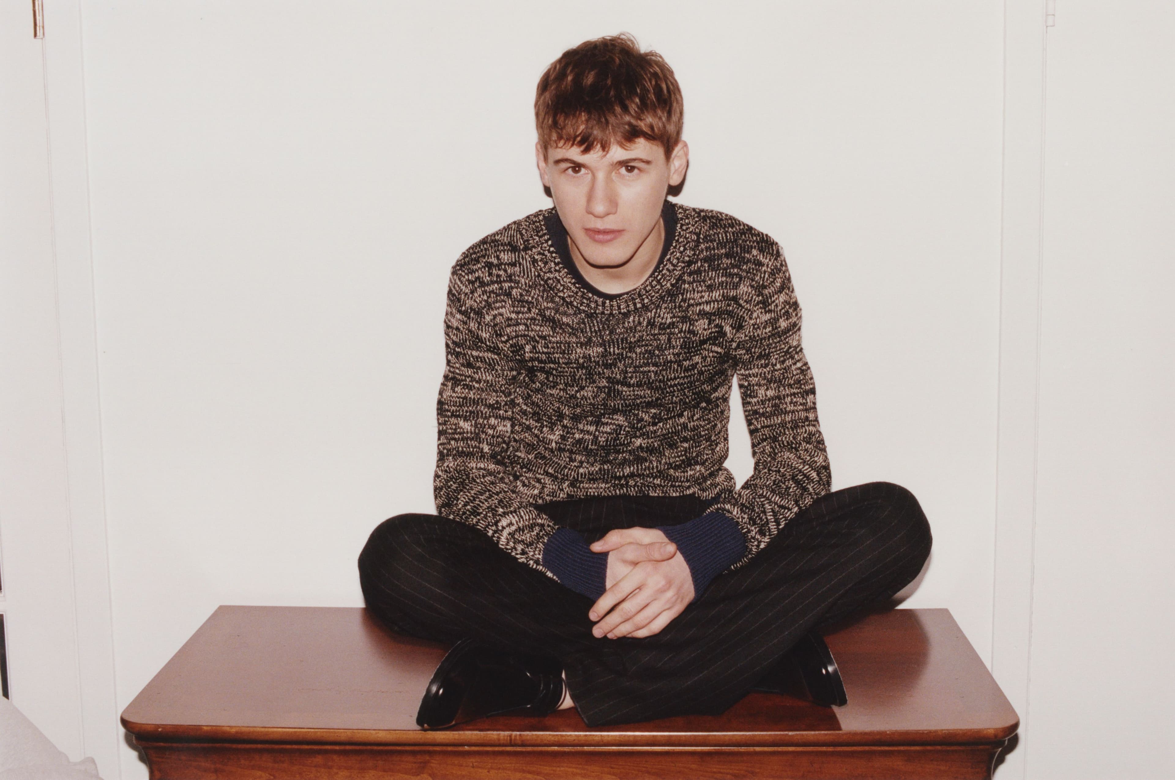 SWEATER by ,Wales Bonner. ,PANTS and SHOES by ,Saint Laurent.