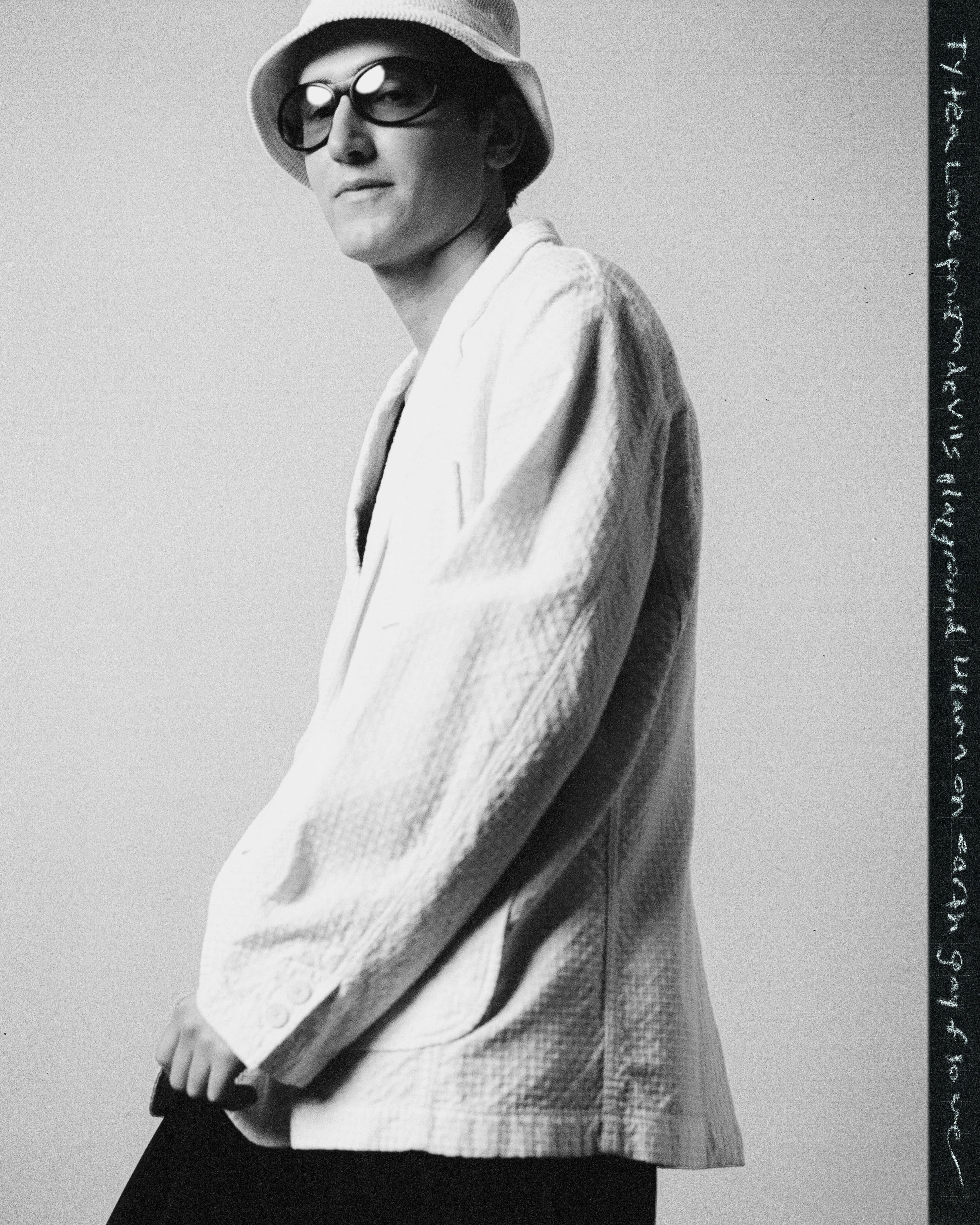 Jacket by KUON. Top by Altu. Skirt and hat from Front General Store. Vintage glasses, stylist’s own.