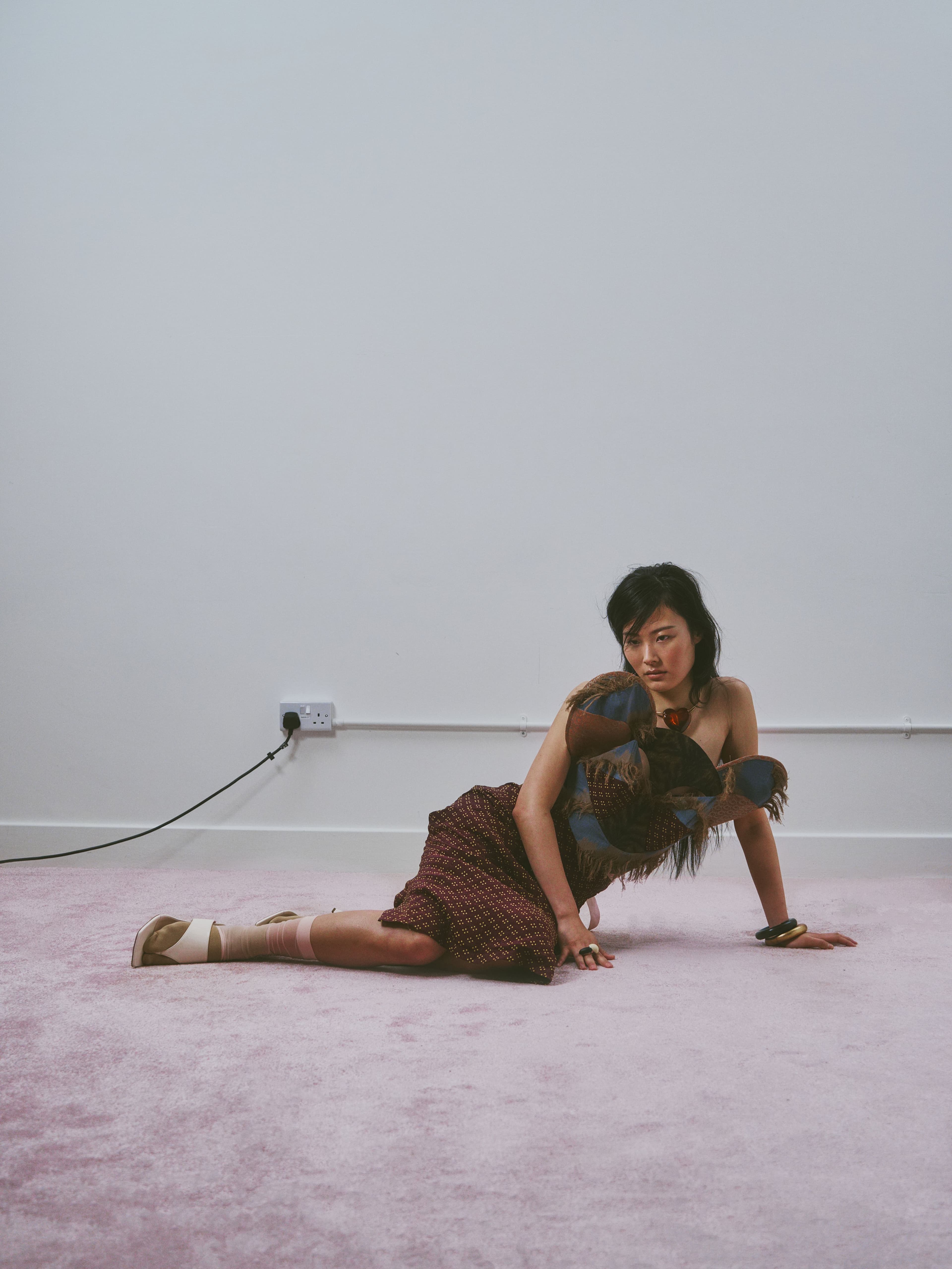 All CLOTHING by Kiko Kostadinov; SHOES by AGL; NECKLACE by Bimba Y Lola; BRACELETS by Monies; RINGS by Dinosaur Design