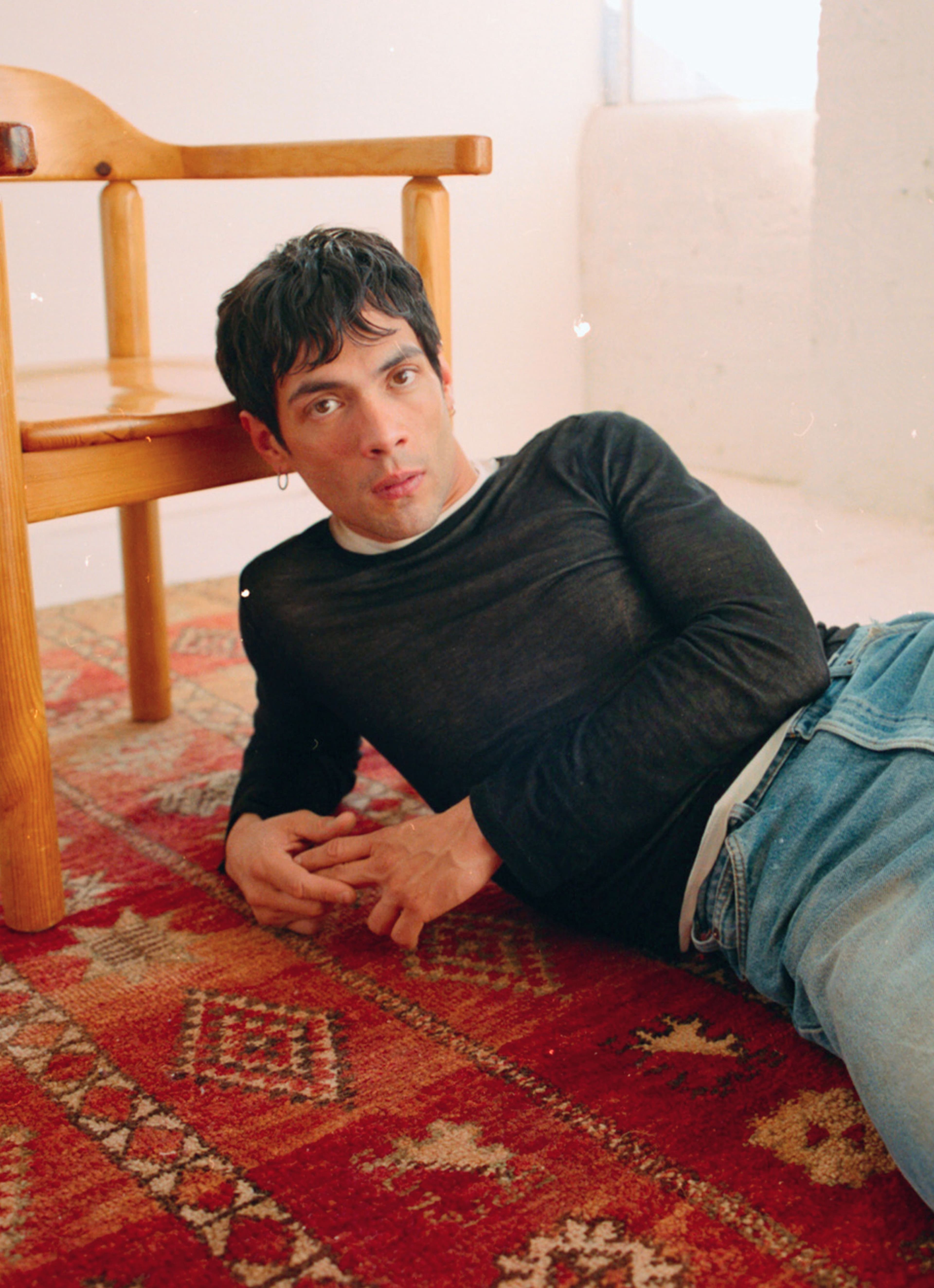 TOP by Eckhaus Latta; vintage JEANS by Levi’s from The Society Archive