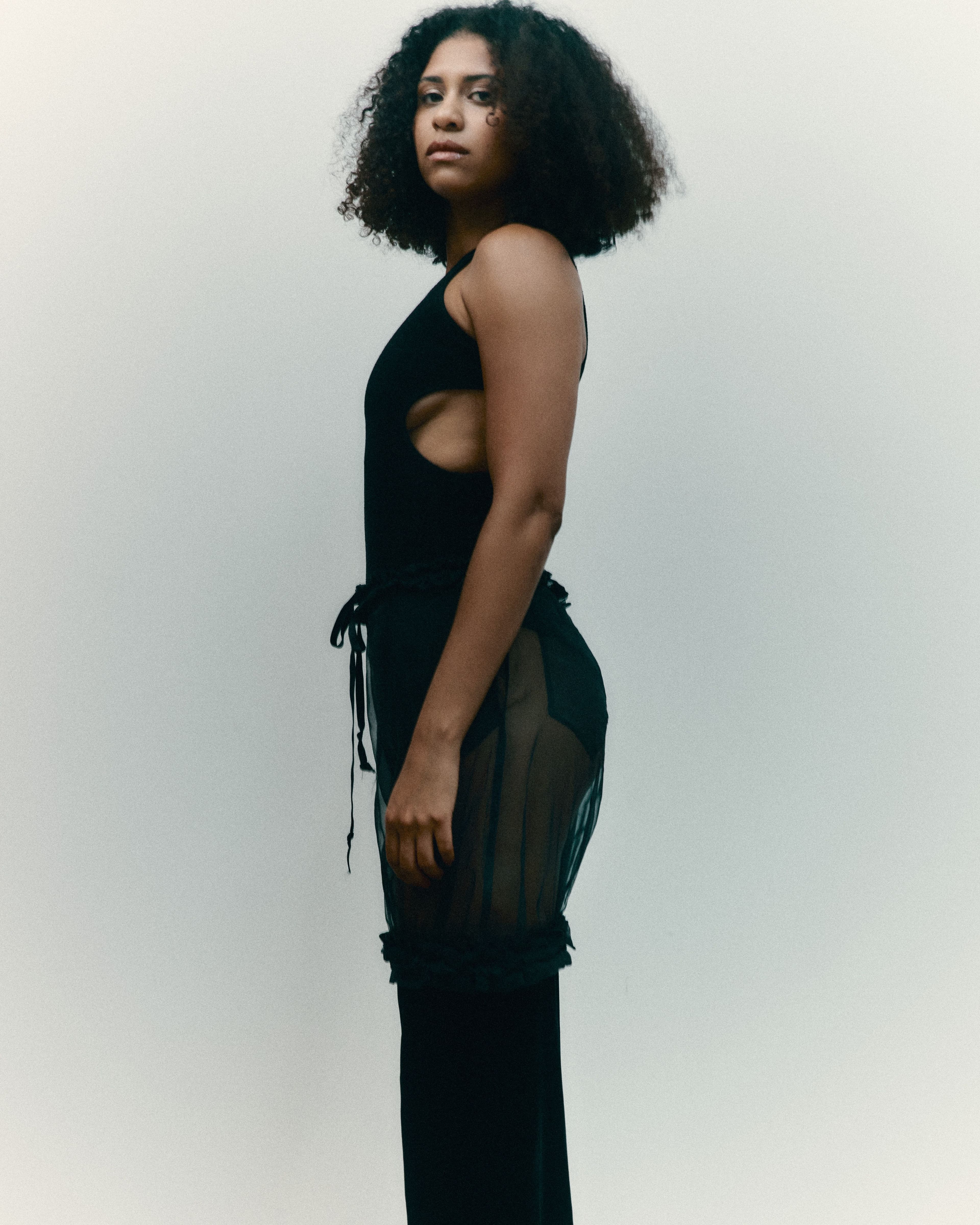 BODYSUIT by ,atelier SOVEN. ,PANTS by ,TRANSE PARIS.