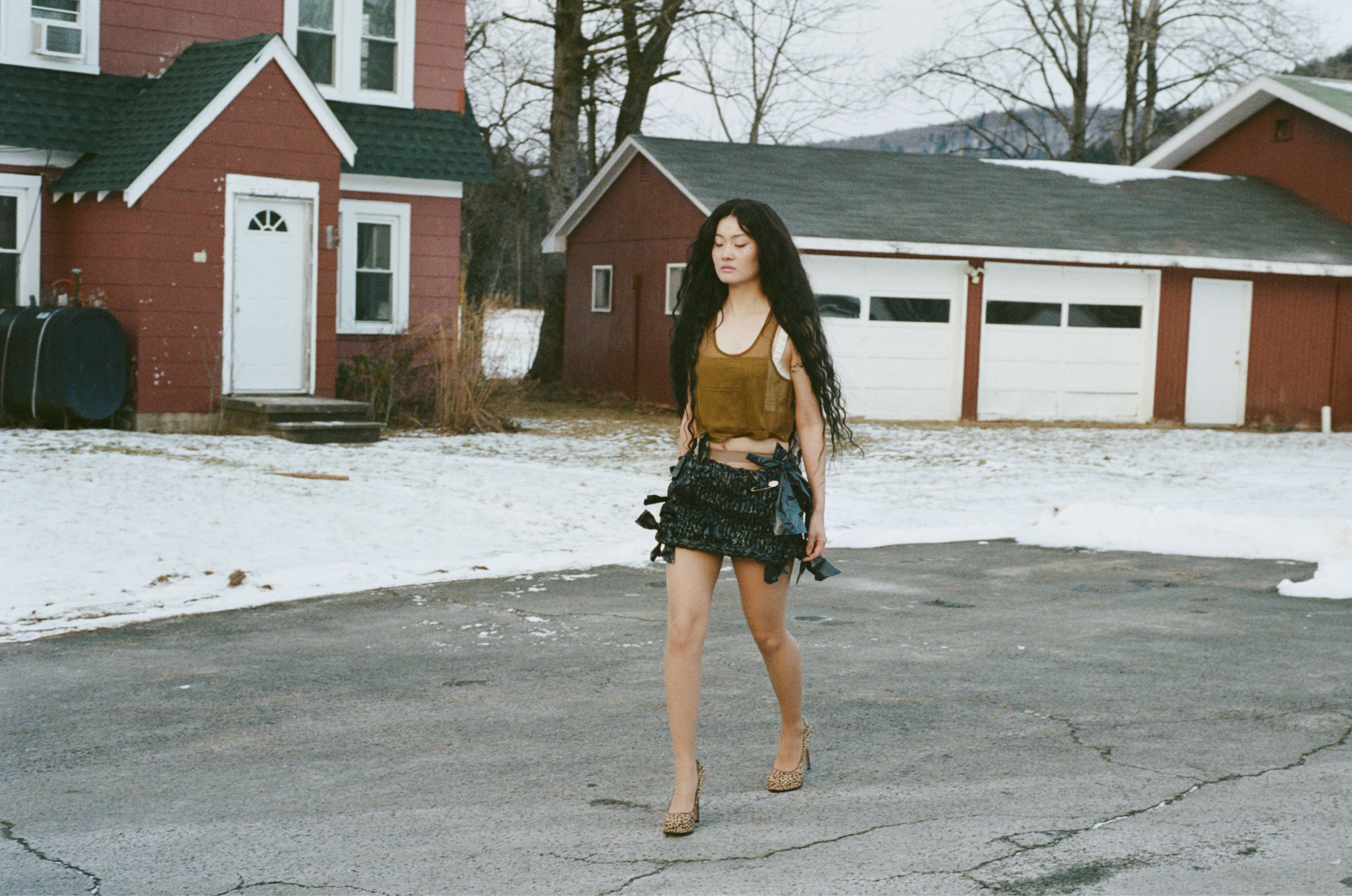 TOP by Hermès. BRA by Amiss. SKIRT by Instinct. SHOES, stylist’s own.