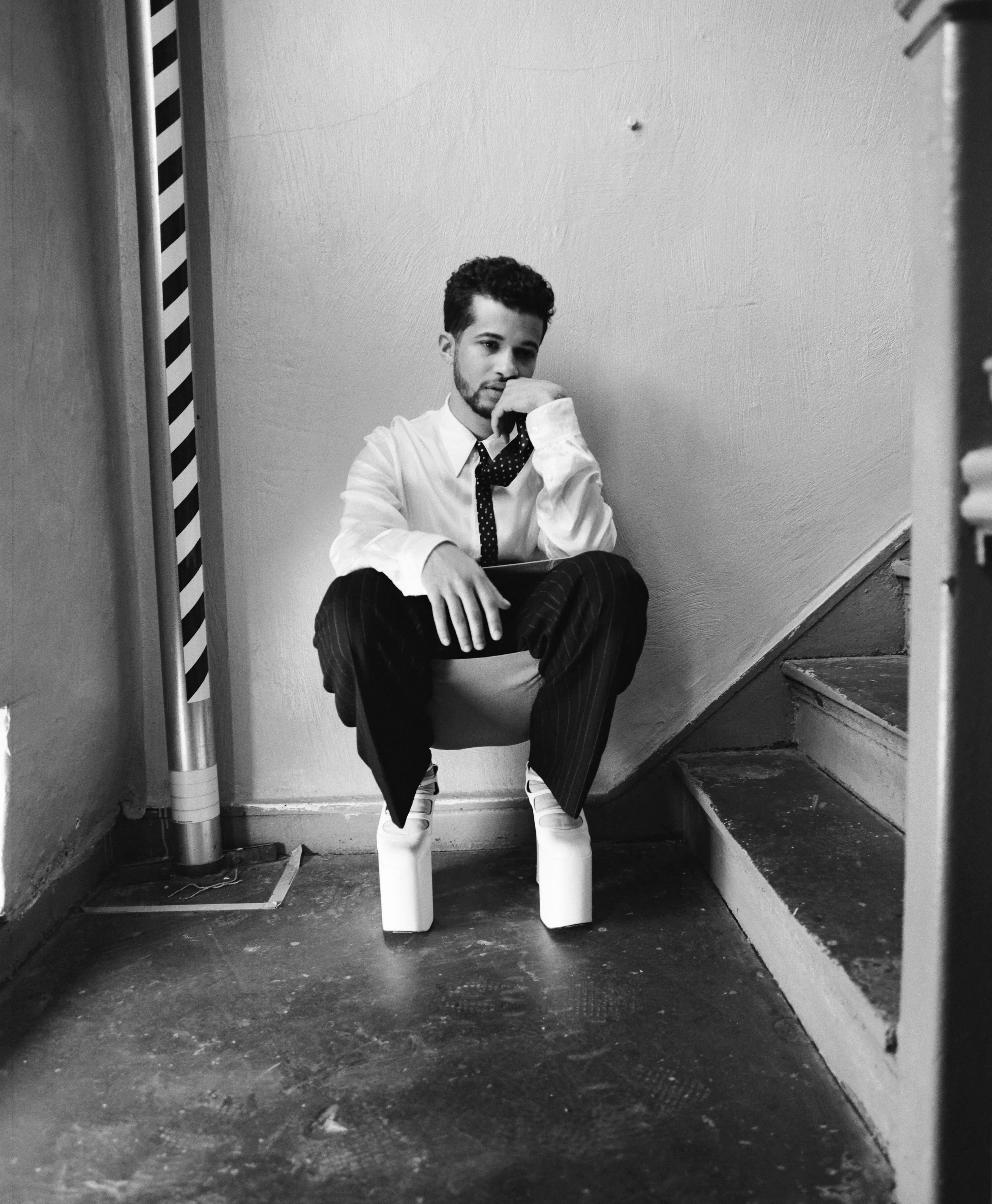 All clothing and tie by Dries Van Noten. Shoes by Marc Jacobs. Socks by Maria La Rosa.