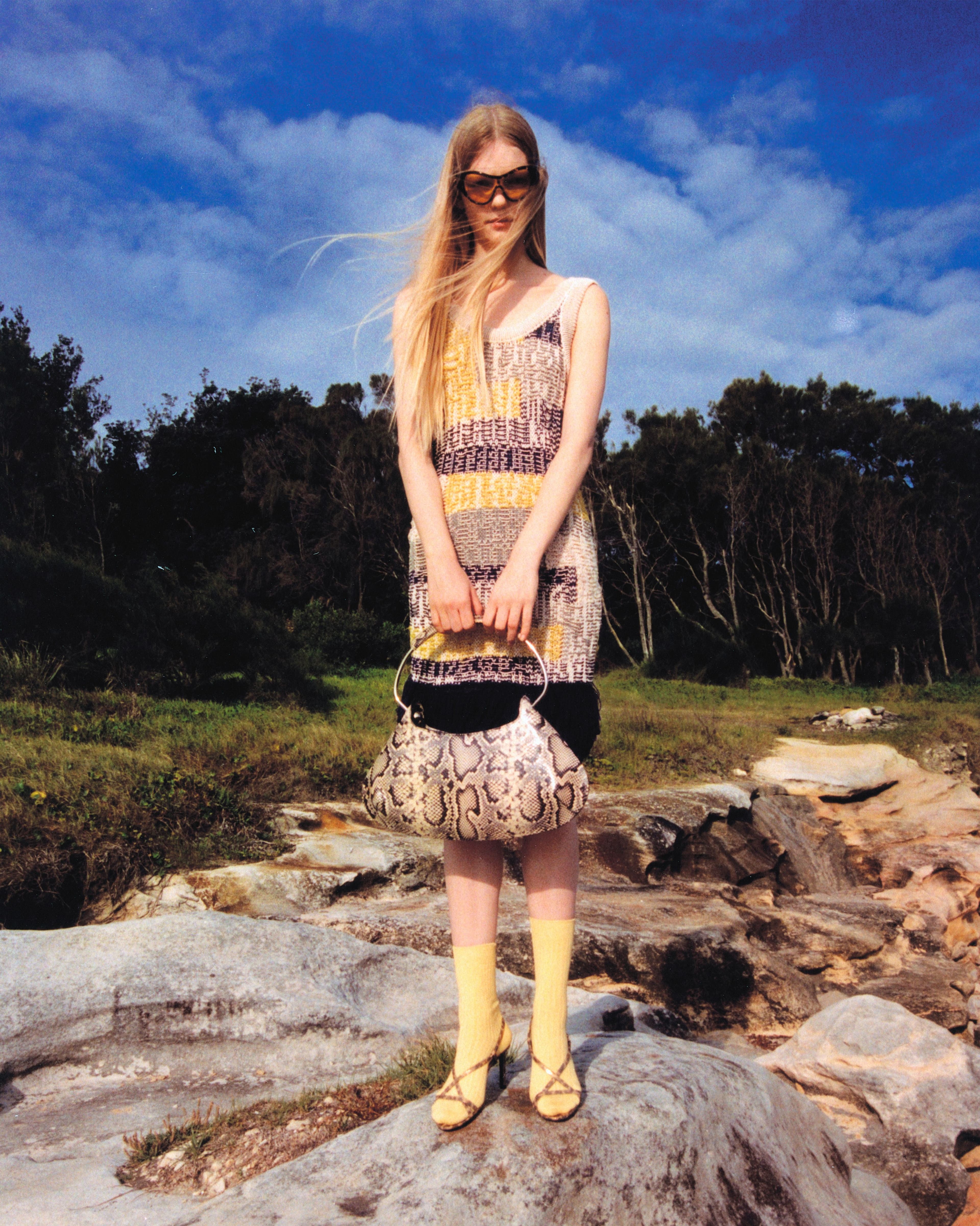 DRESS and BAG by ,Sportmax. ,GLASSES by ,Christopher Esber. ,SHOES by ,Celine. ,SOCKS, stylist’s own.