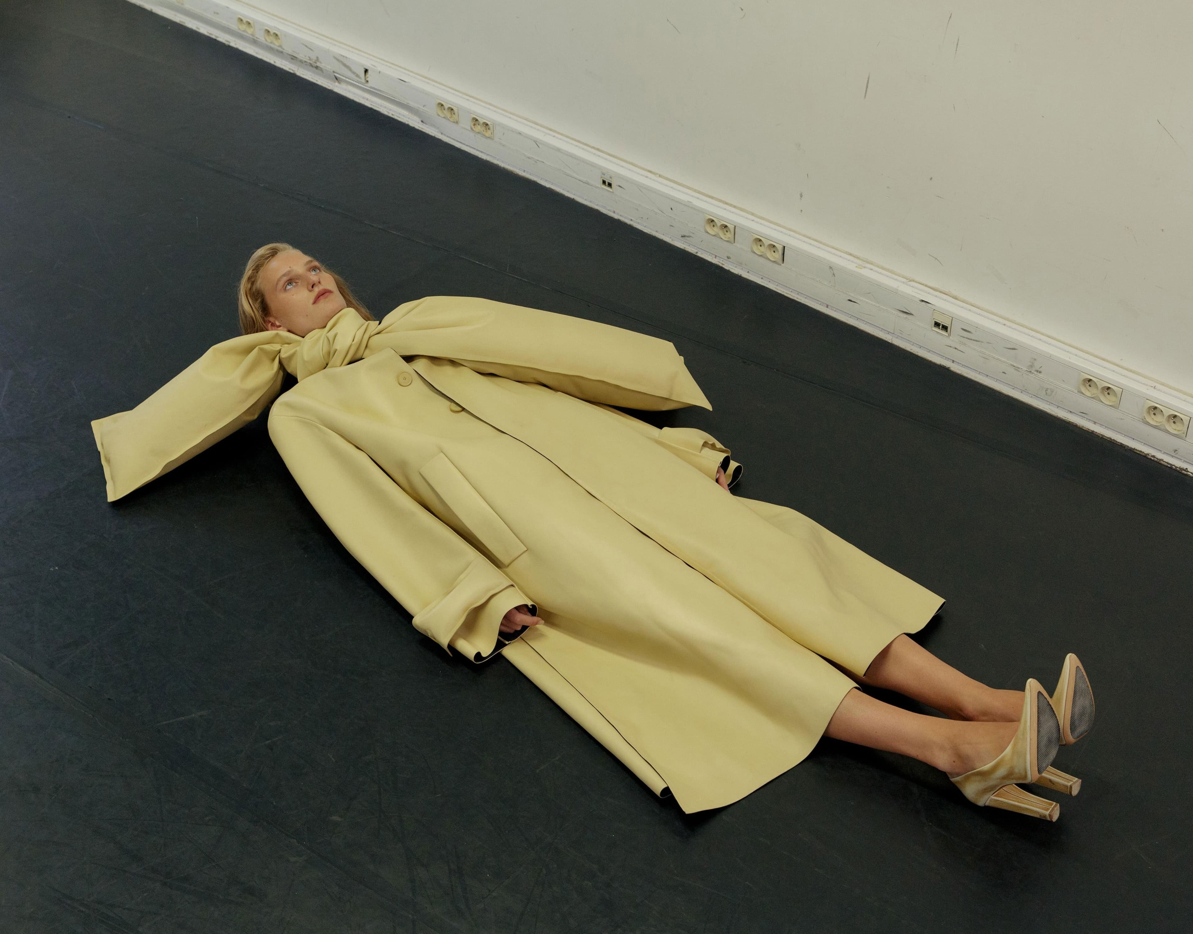 COAT by Loewe; SHOES by Louis Vuitton