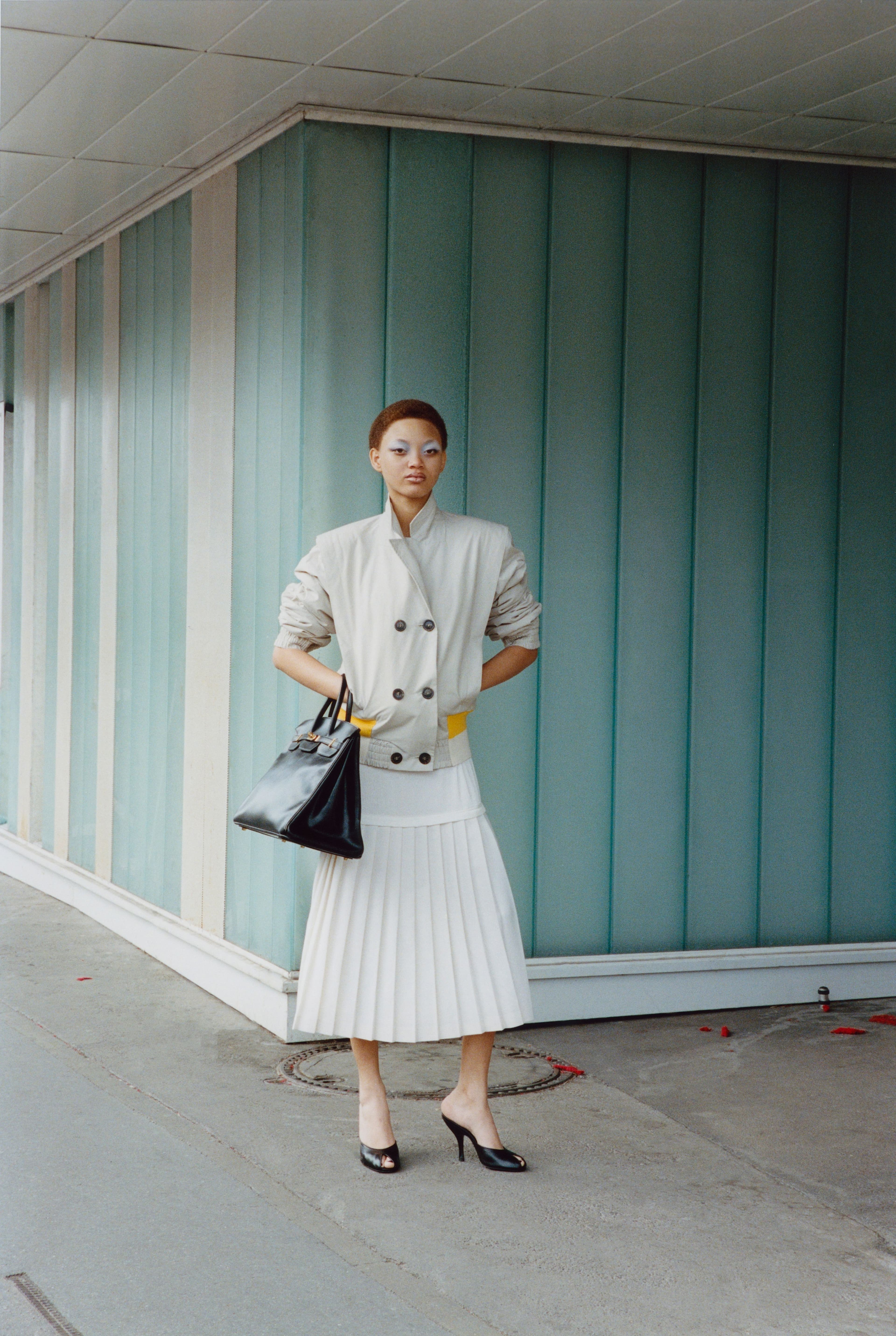 All CLOTHING by Stefan Cooke; BAG by Hermès; SHOES by Jude
