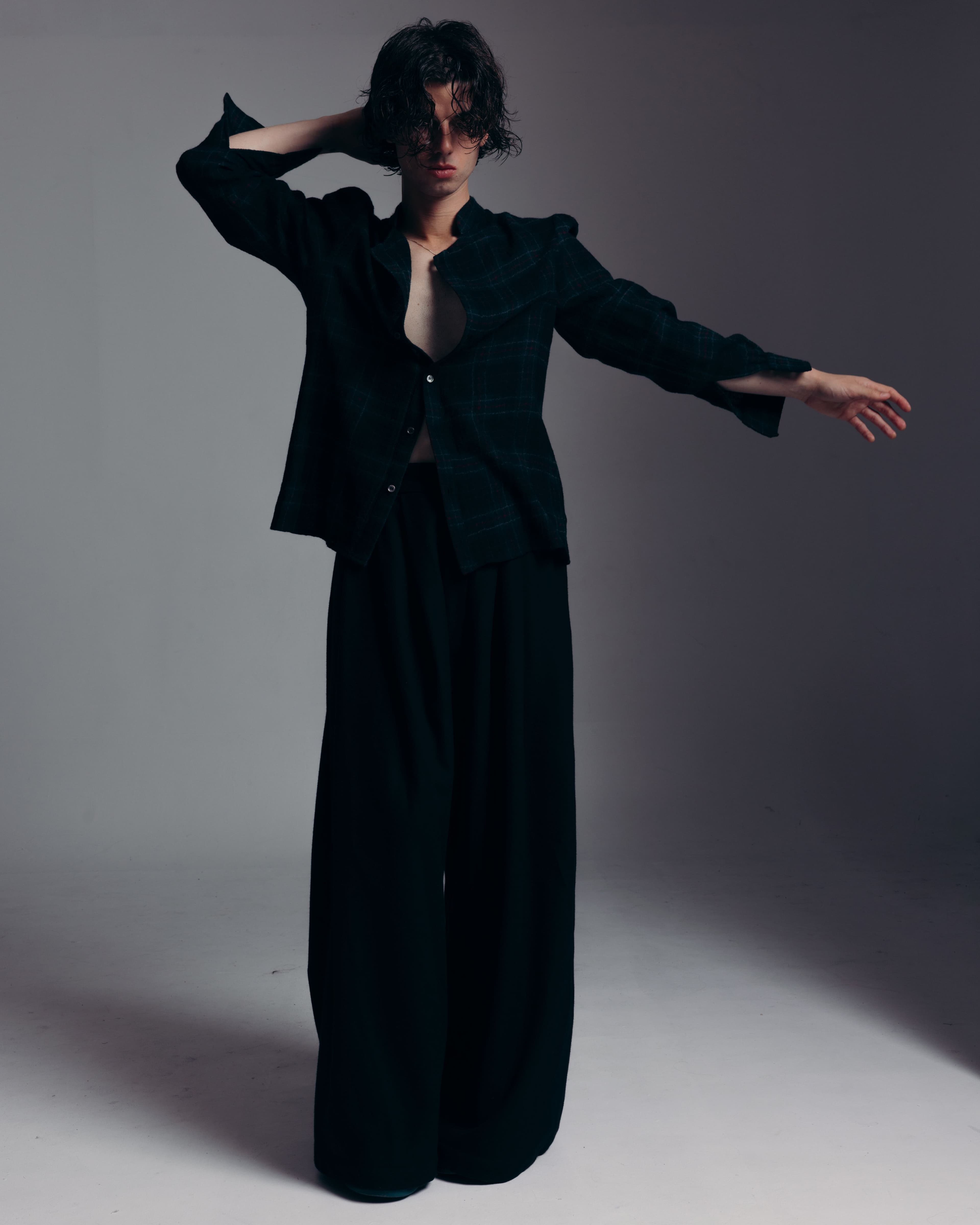 All CLOTHING by ,Willy Chavarria. ,SHOES by ,Jil Sander. ,NECKLACE by ,Miansai.
