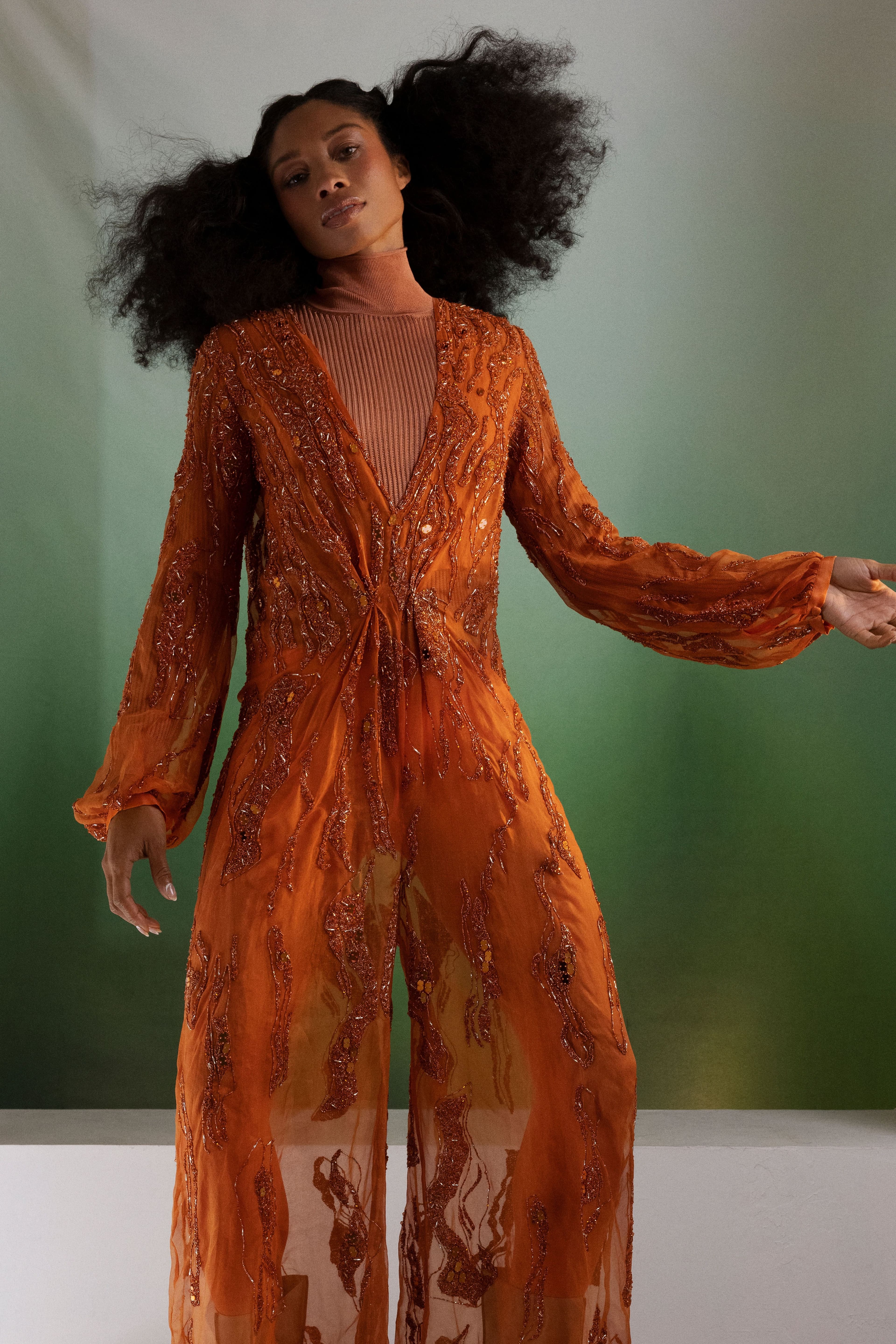 Jumpsuit by Aliétte. Turtleneck by Hermès.