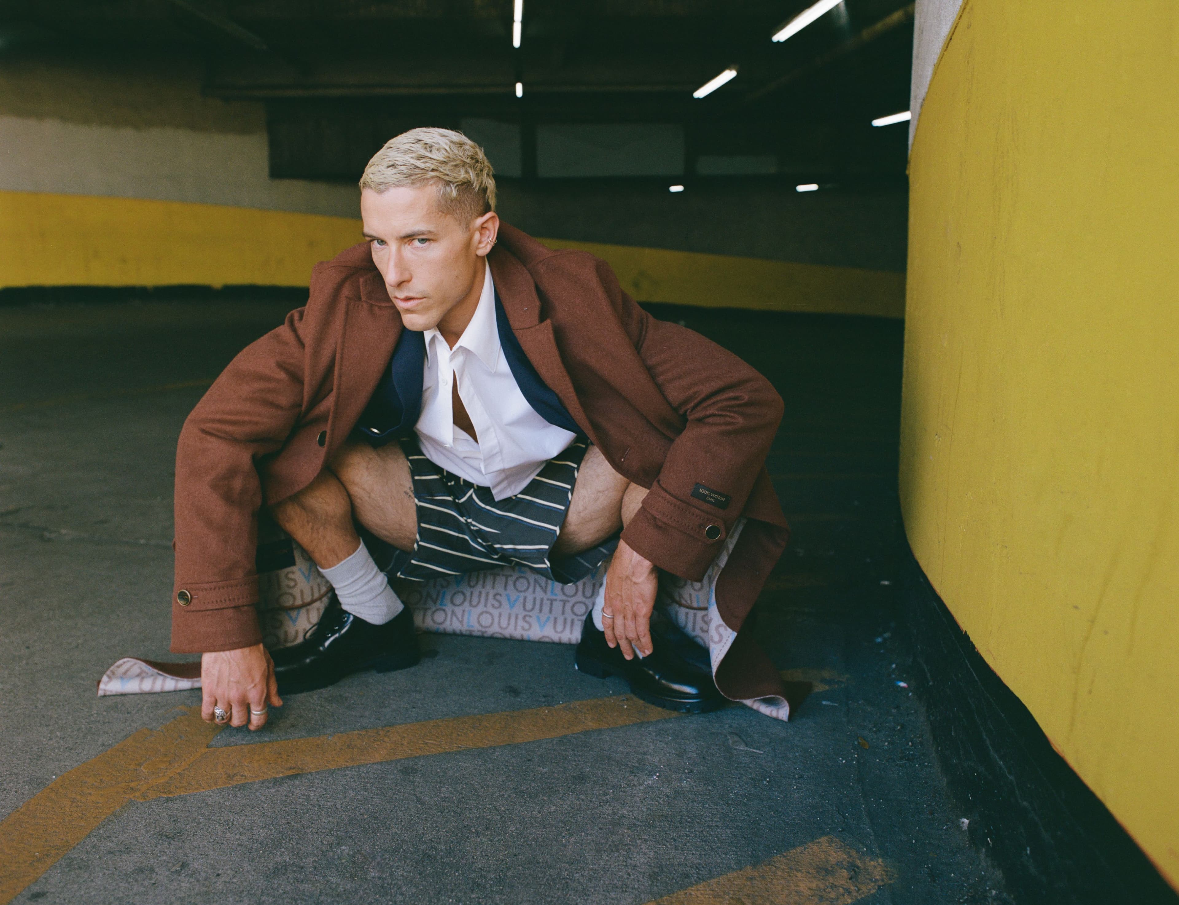 All CLOTHING by Louis Vuitton; SOCKS, stylist’s own; SHOES by Hermès