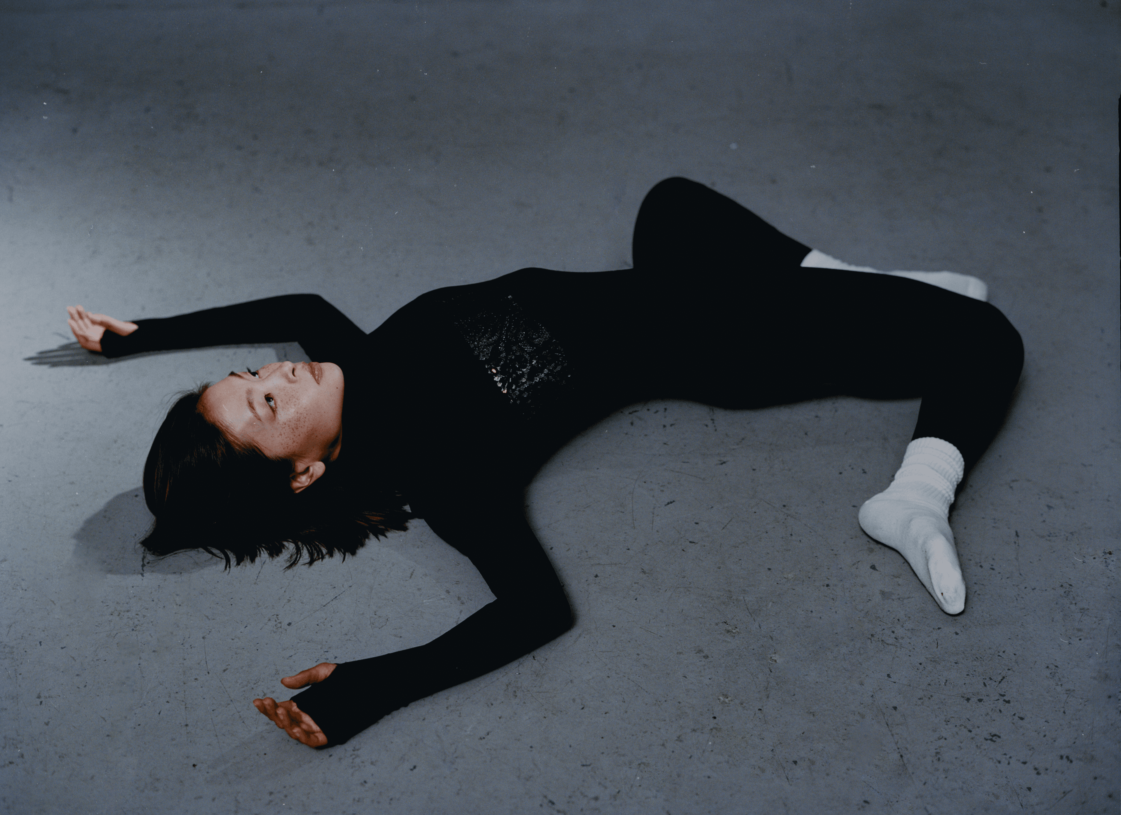 CATSUIT by Norma Kamali. BRA by Malcolm D. Costa.