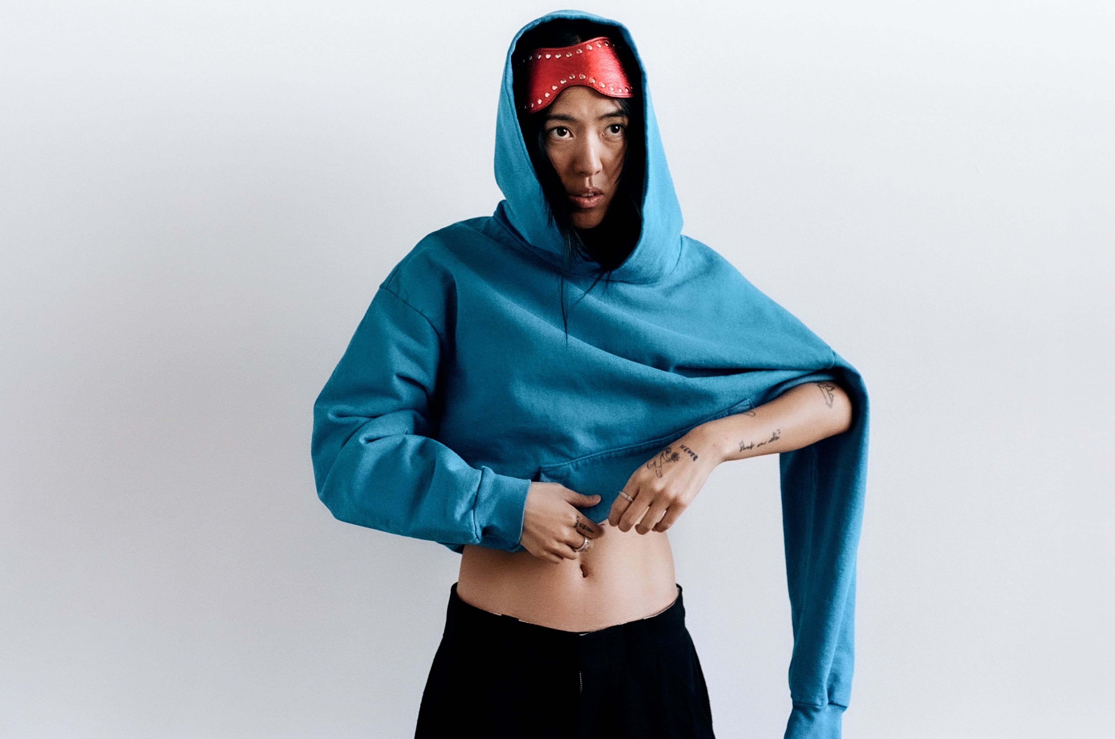 SWEATSHIRT by Everybody.World; PANTS by 6397; MASK by Zana Bayne