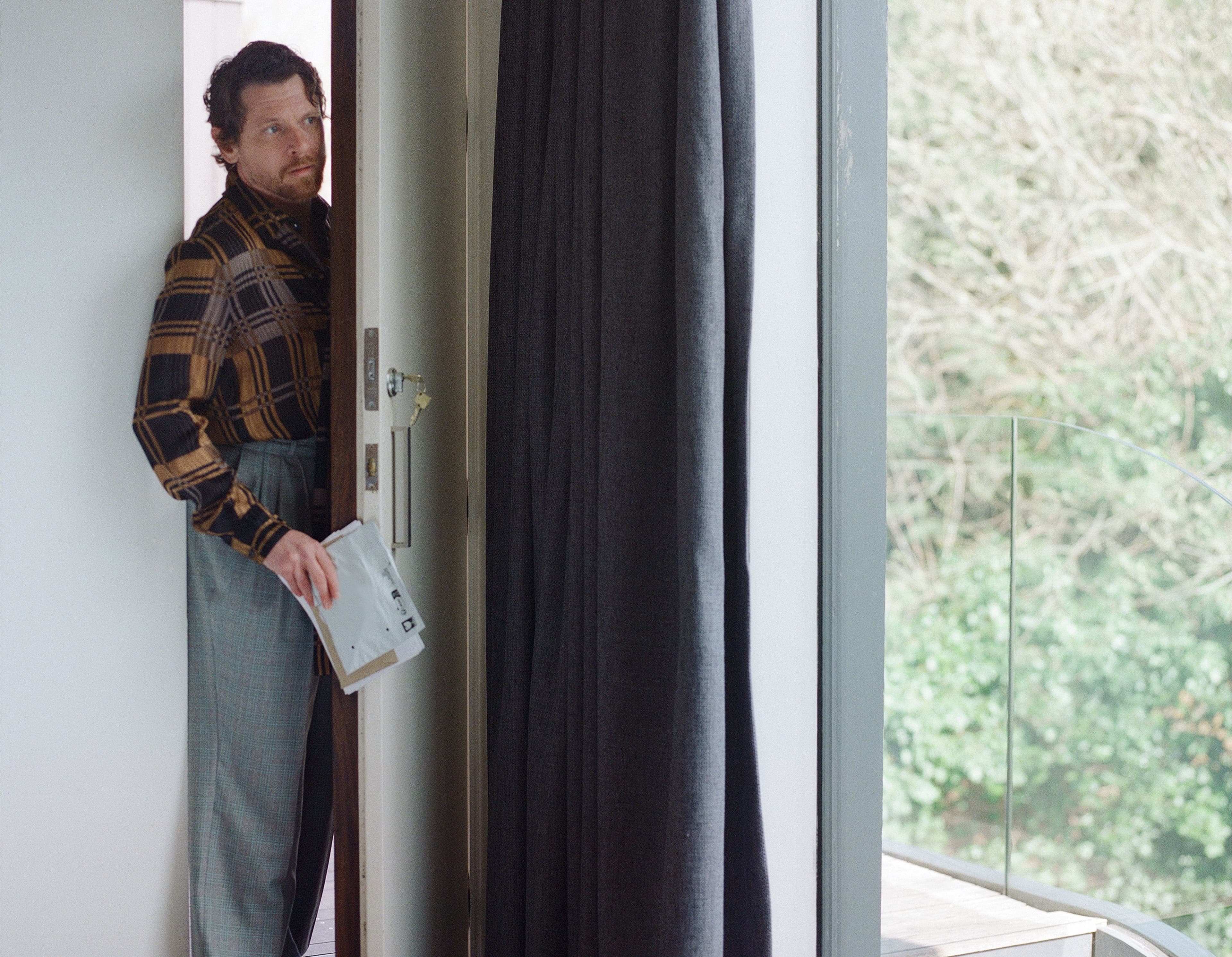 TOP and TIE by ,Saint Laurent,. PANTS by ,Paul Smith.