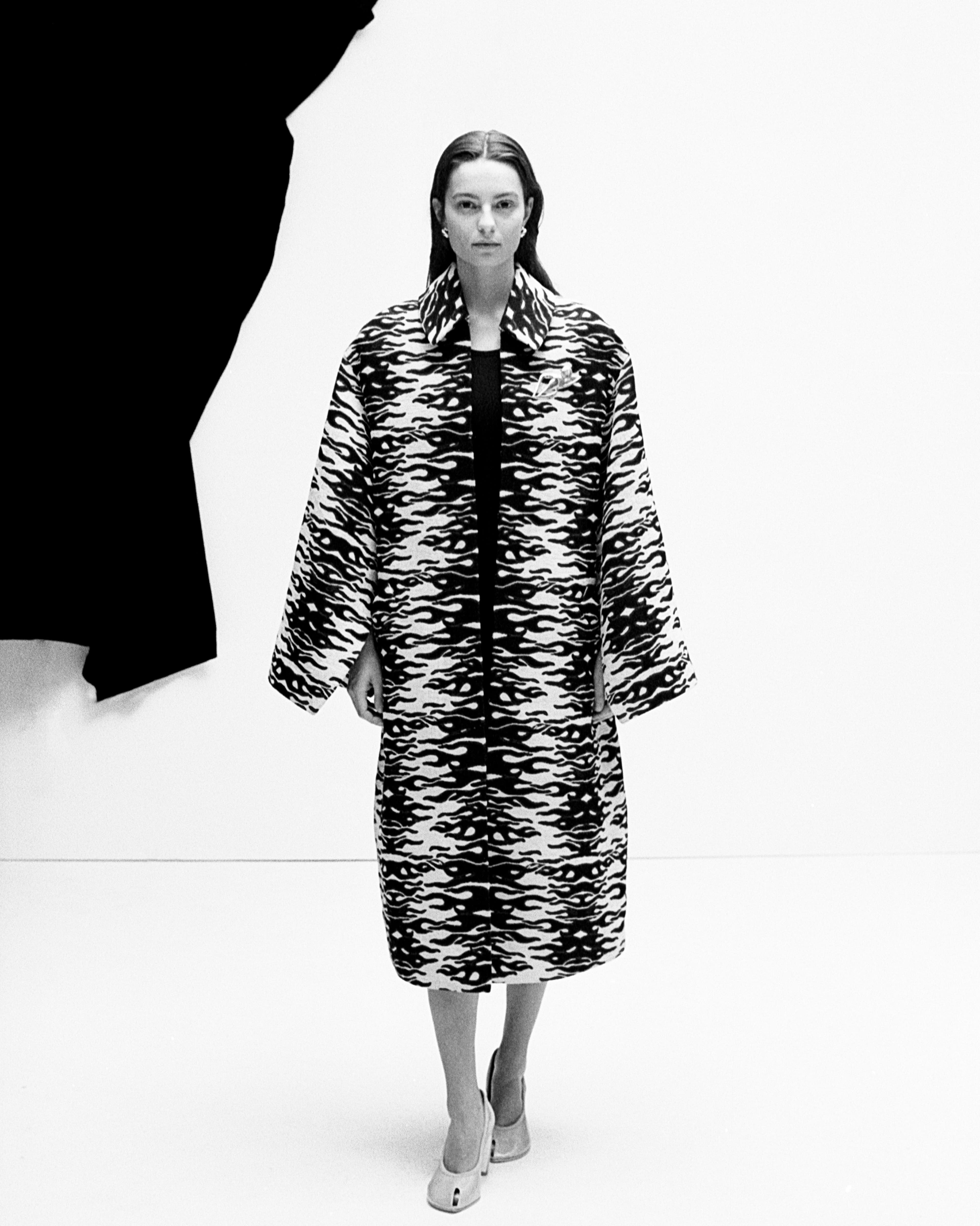 All CLOTHING and SHOES by ,Tory Burch. ,EARRINGS by ,Jasmin Sparrow.