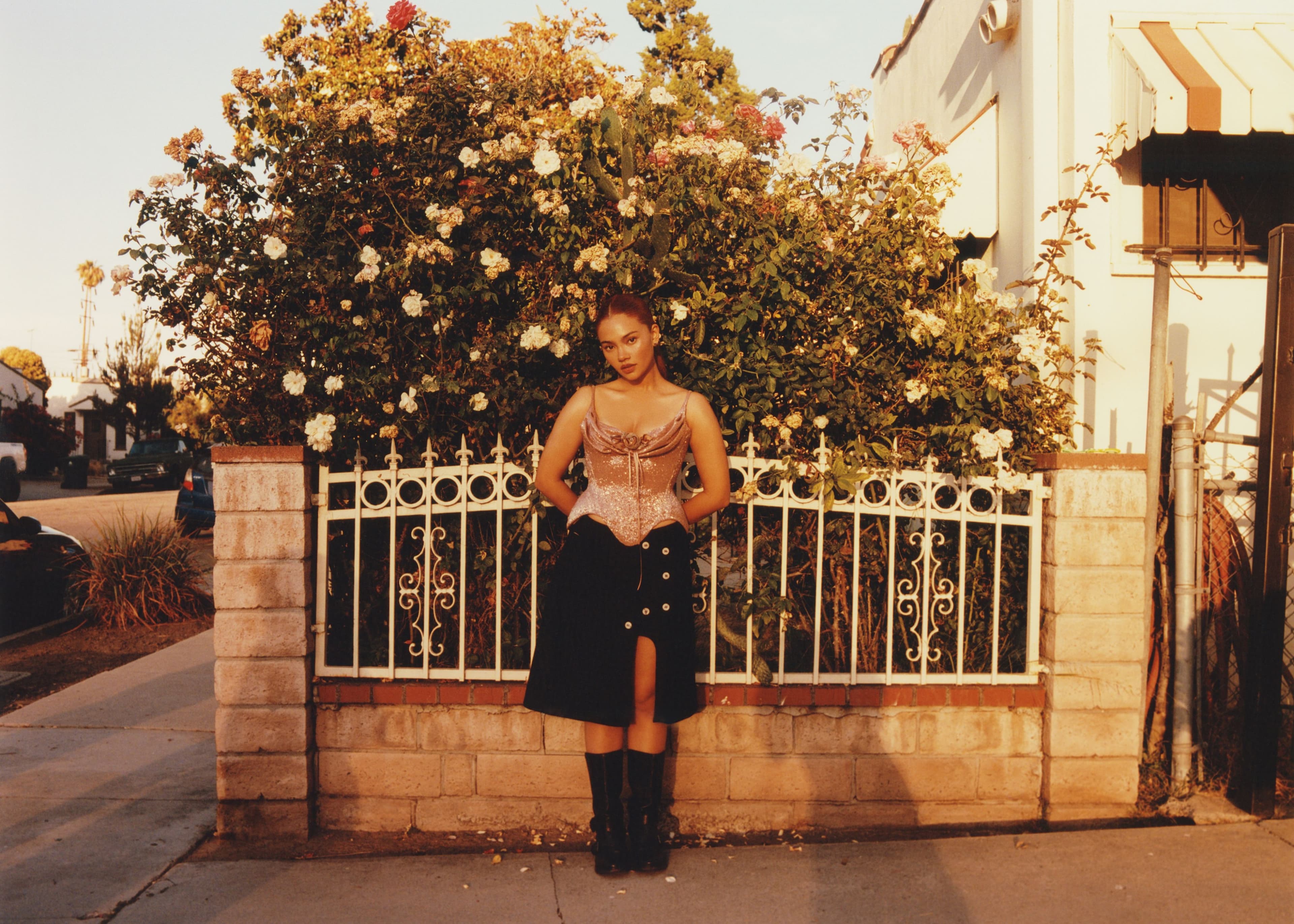 TOP by Wiederhoeft; SKIRT by Anya Baghdassarian; SHOES, stylist’s own; all JEWELRY by Cat Janiga