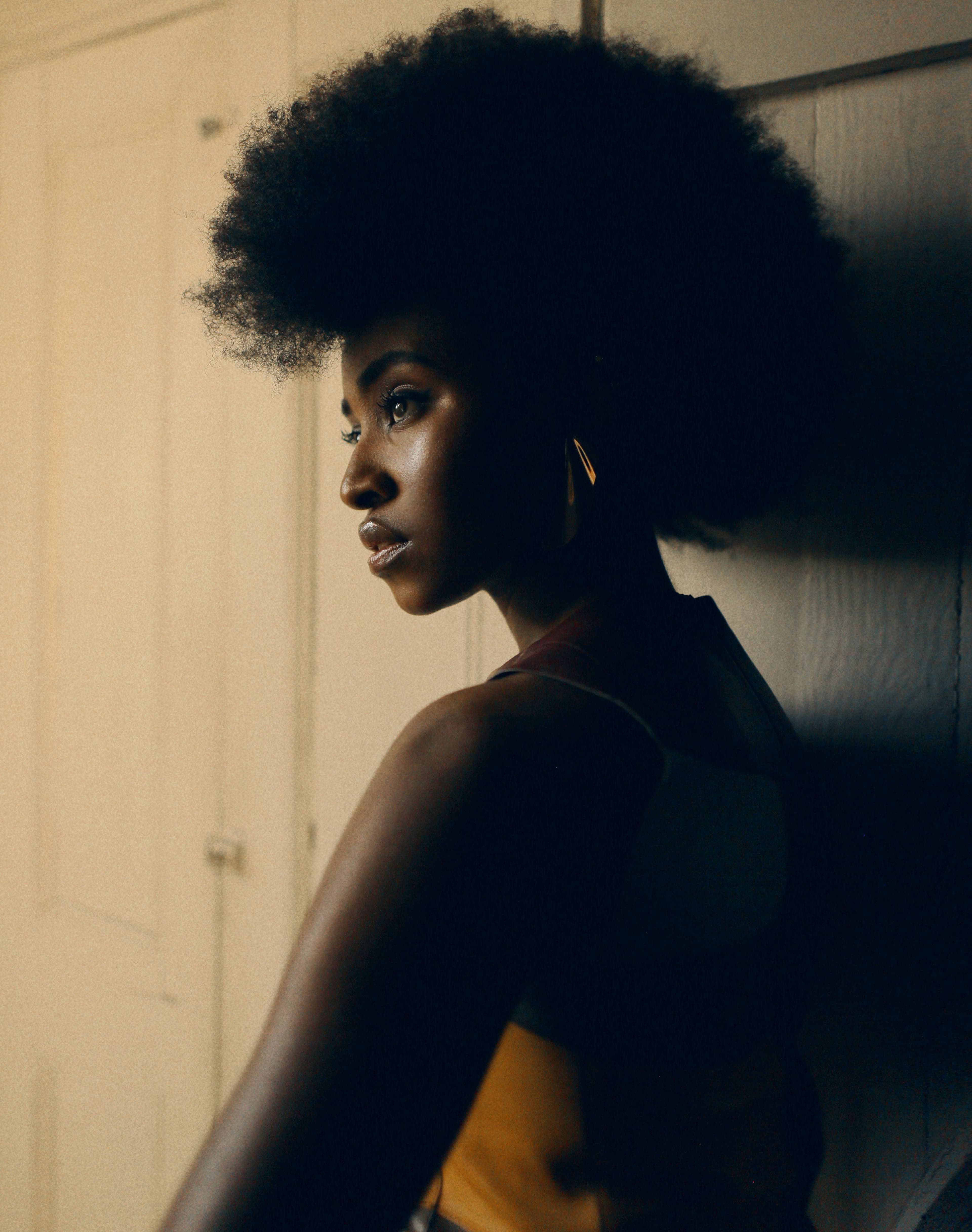 Dress by Chloé. Earring by Tiffany & Co.