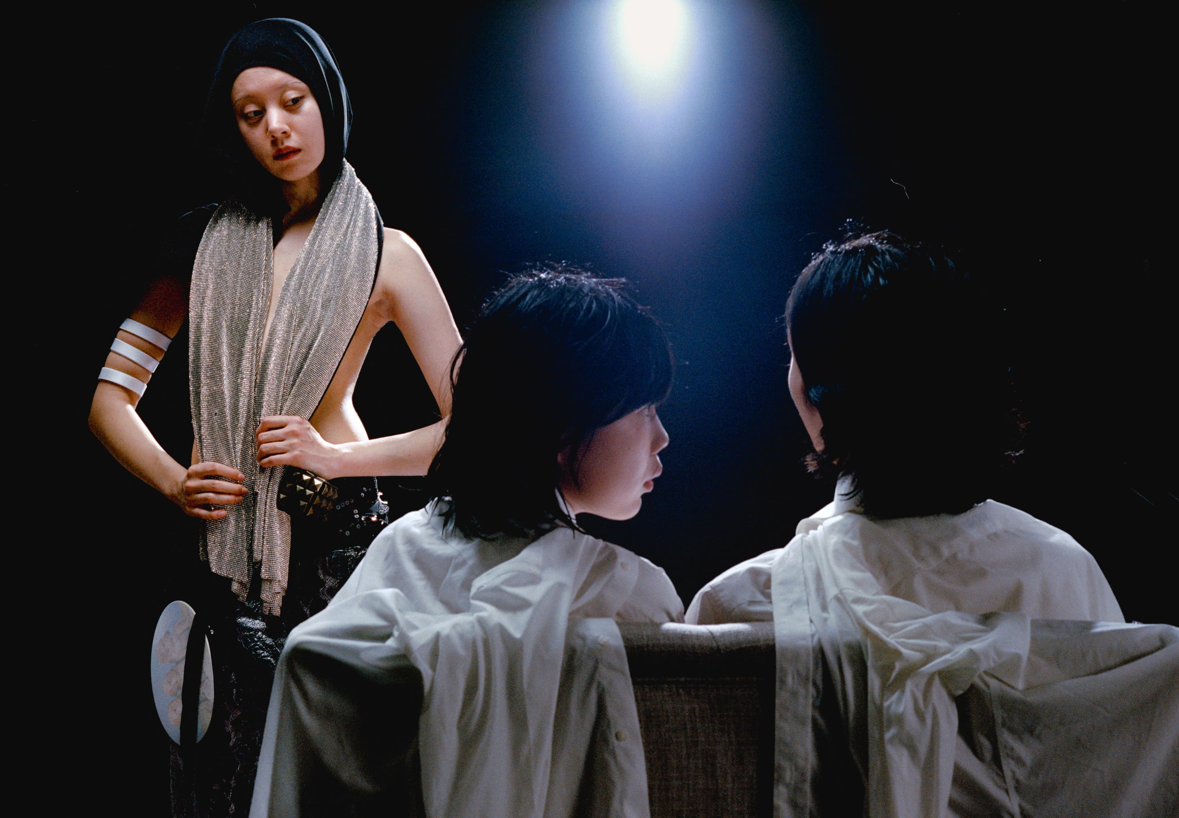 FROM LEFT: Aisha wears SHIRT, stylist’s own. SKIRT by ,All-In. ,Echo and Kung wear SHIRTS, stylist’s own.