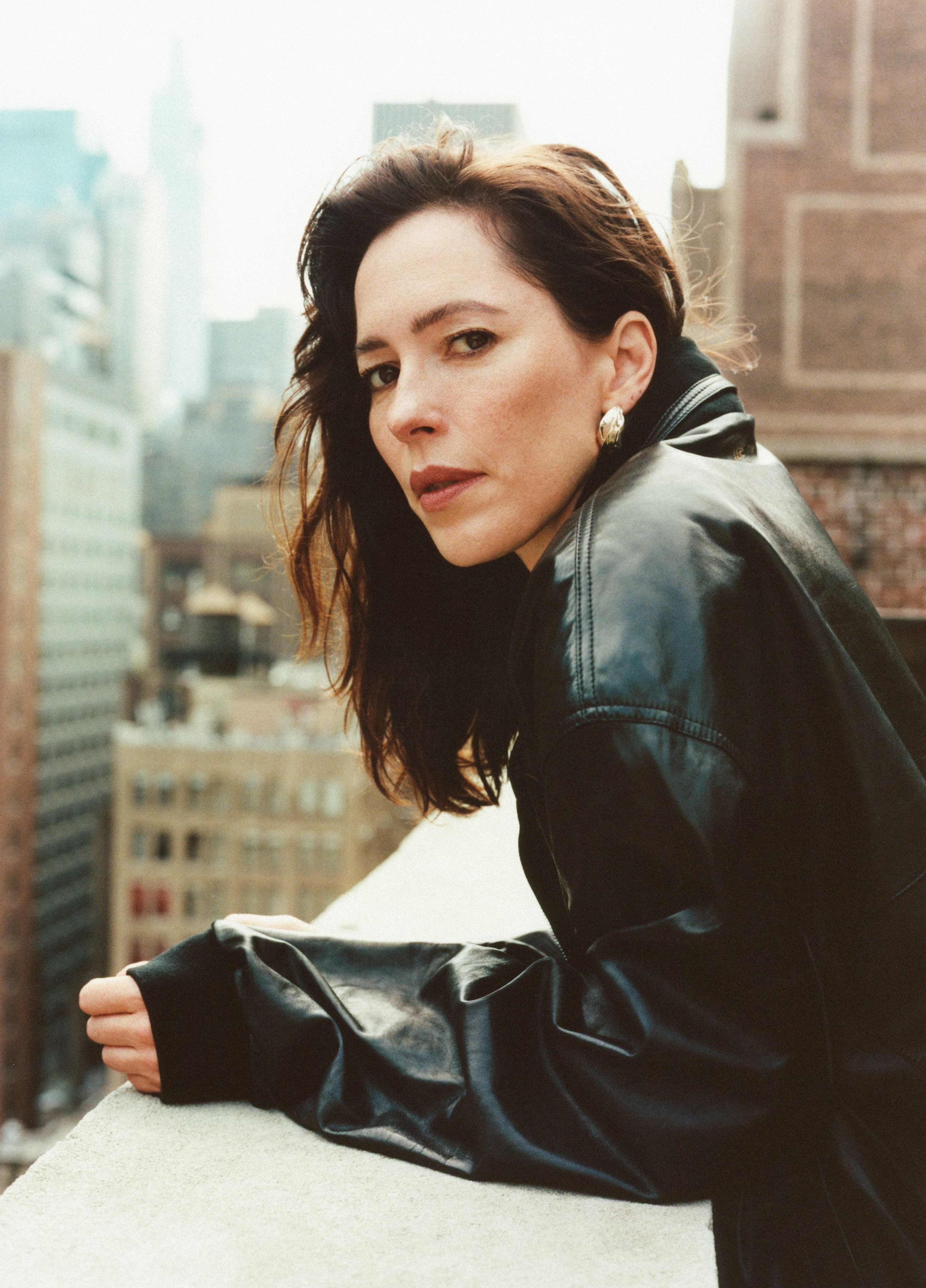 JACKET by Versace; EARRINGS by Ariana Boussard-Reifel