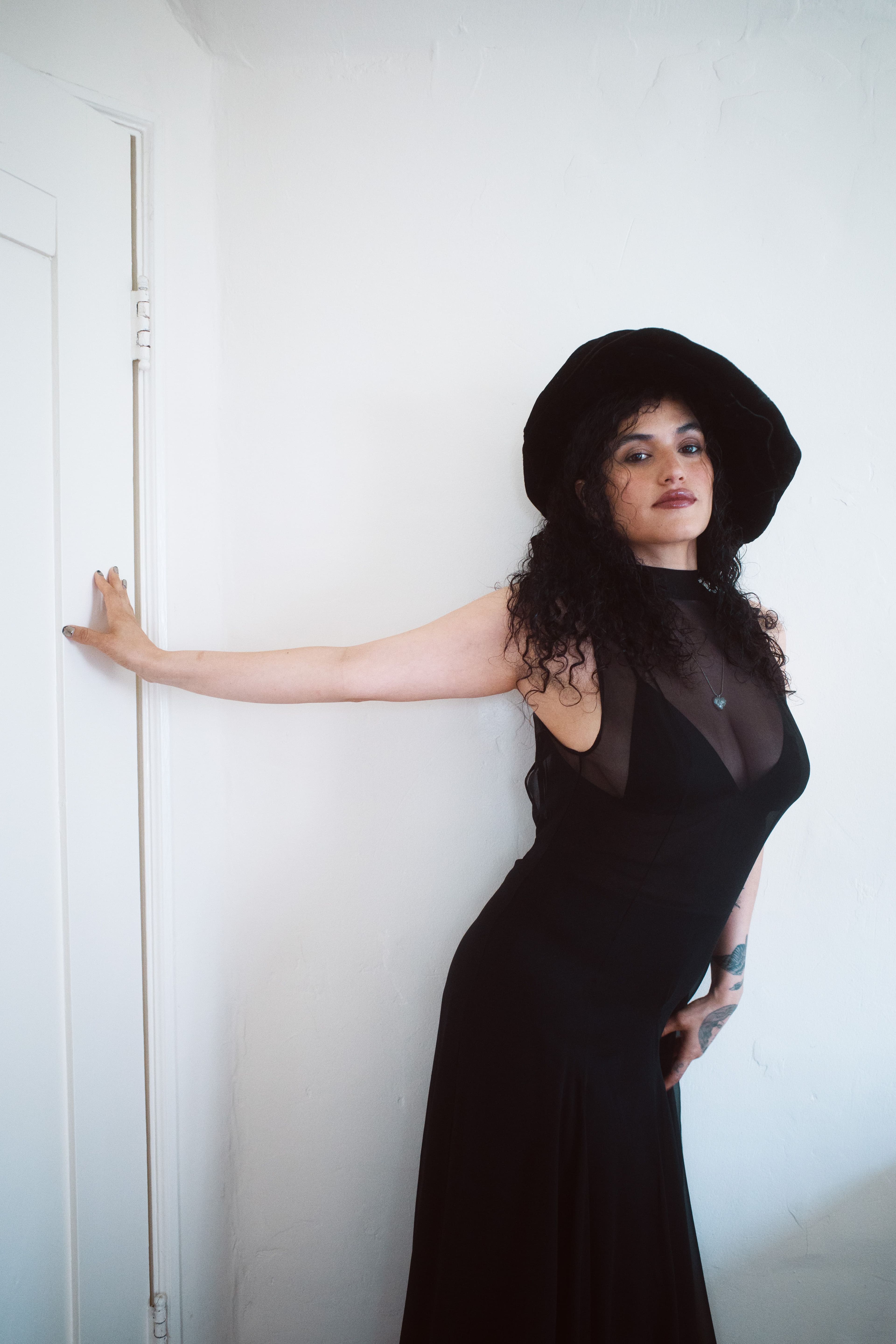 DRESS by ,Michelle Rhee. ,Vintage HAT. NECKLACE by ,Low Classic.