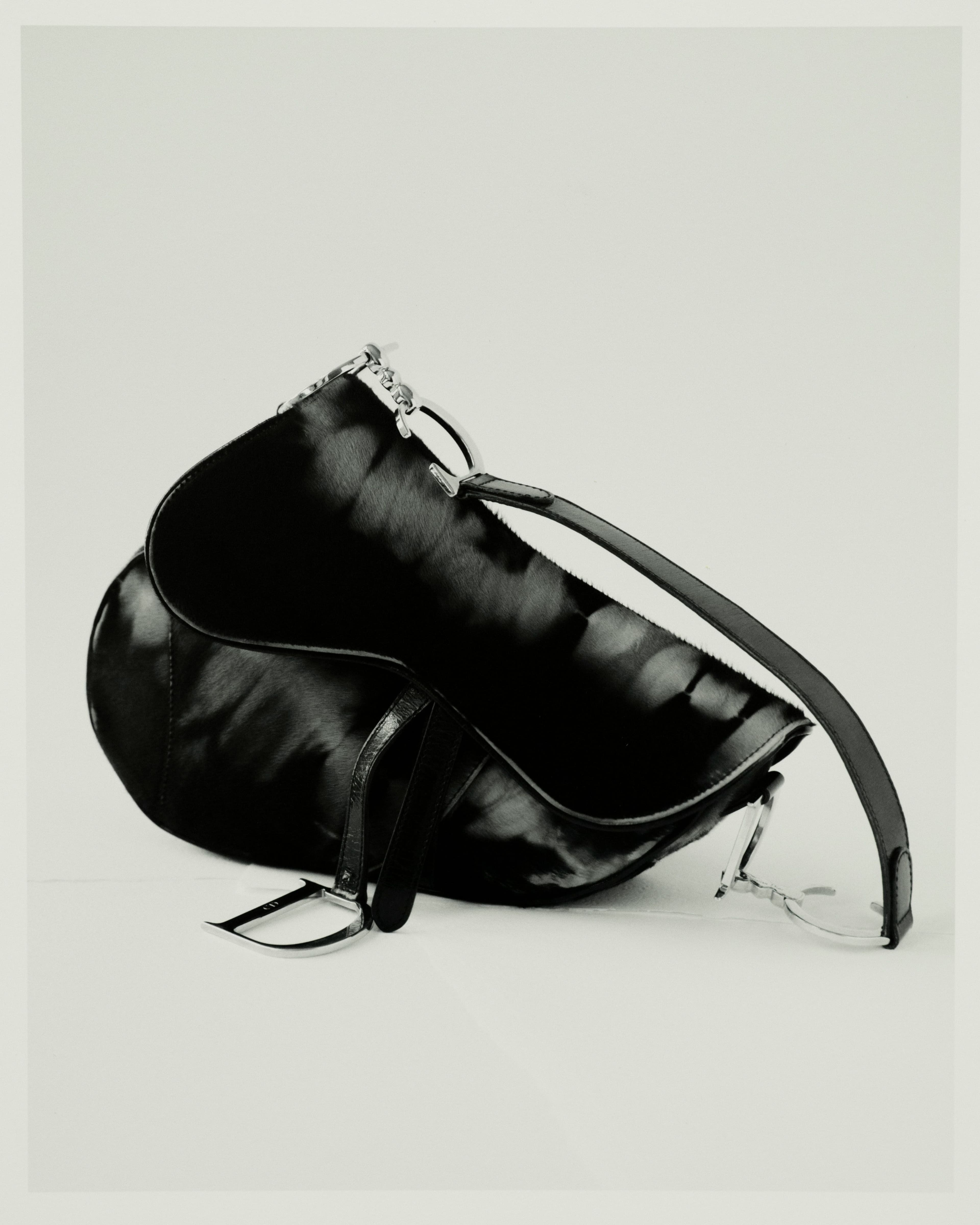 Vintage bag by Dior, early 2000s, from Gabriel Held. Since being introduced by John Galliano in 1999, the Saddle Bag became one of the most iconic accessories of the early 2000s and is experiencing a revival today.