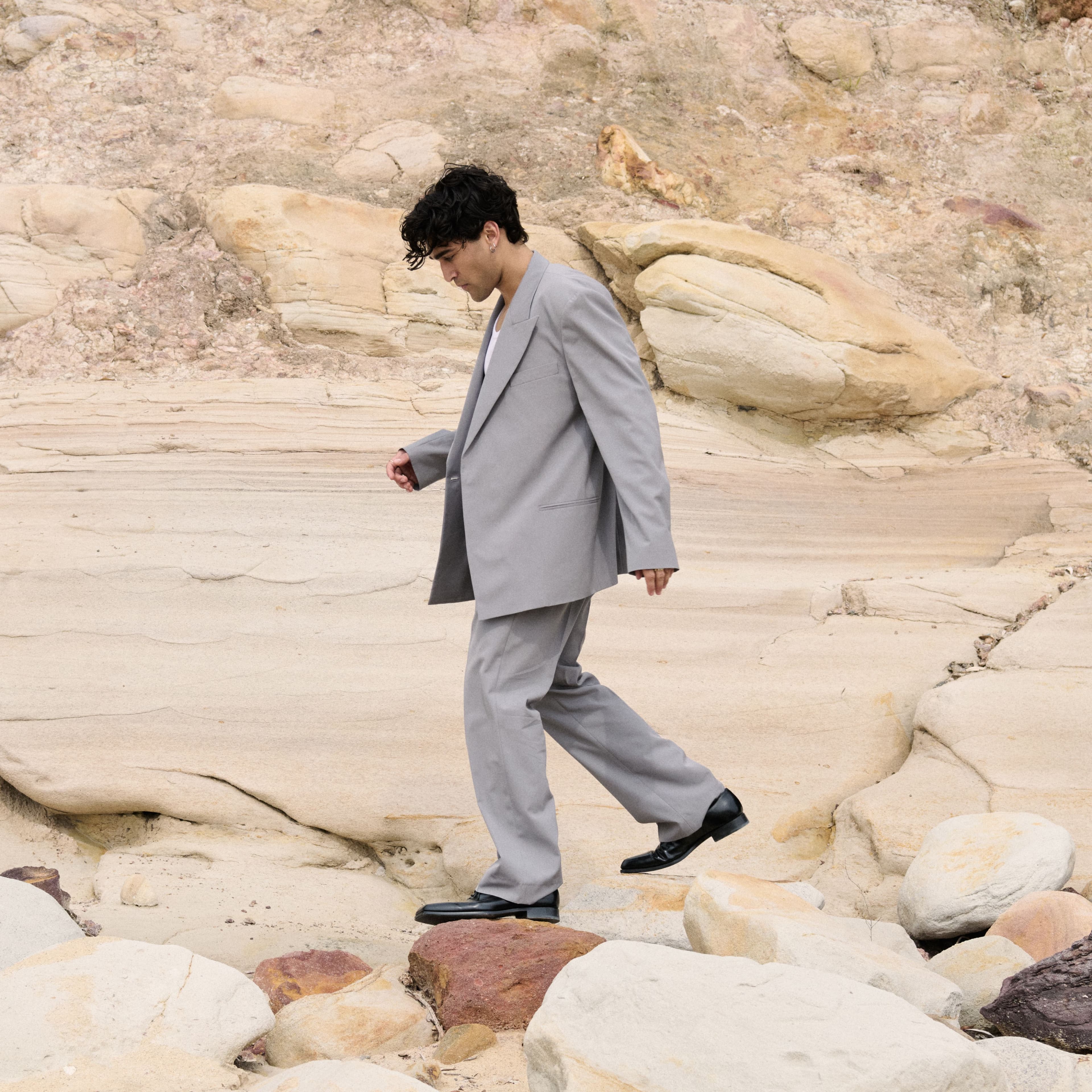SUIT by ,Acne Studios. ,TOP by ,Bottega Veneta. ,SHOES by ,Prada.