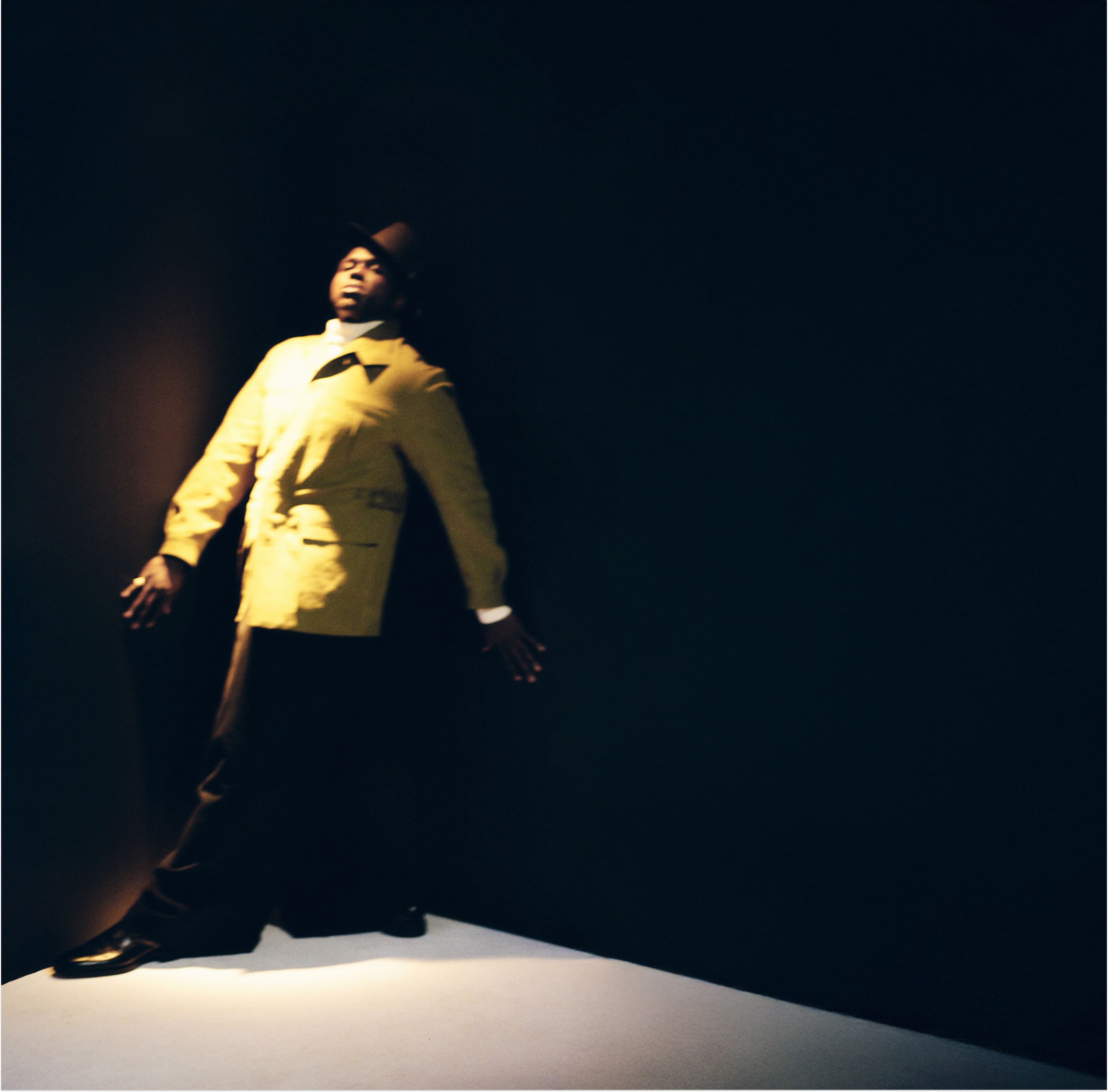 JACKET by Zegna; SWEATER by Ferrari Style; PANTS by Lu’u Dan; HAT by Joy Kim; SHOES by Santoni; RING by Miansai