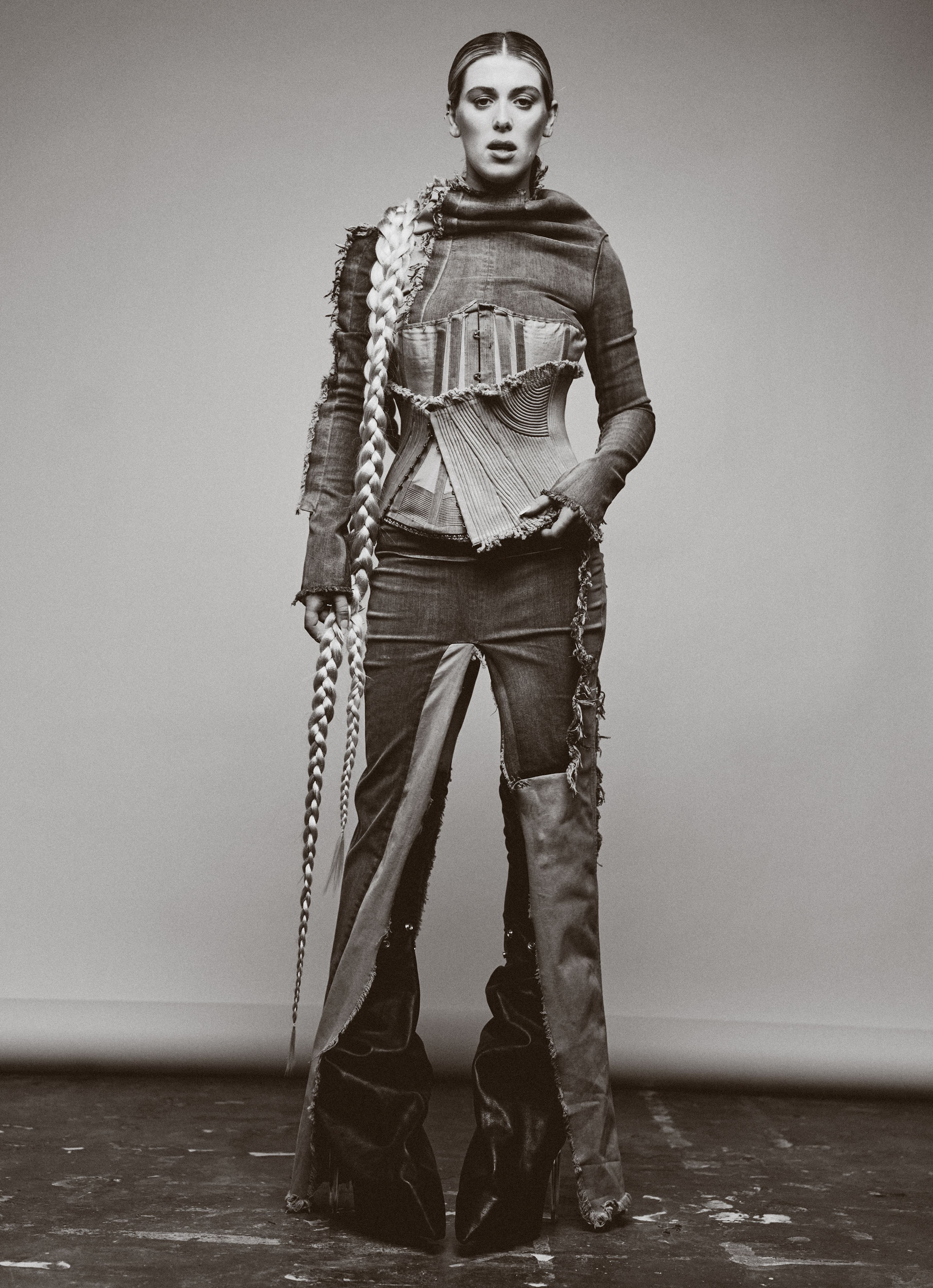 TOP, PANTS, and BOOTS by Rick Owens; CORSET by Rebecca Sweeting; Vintage CORSET from Rellik