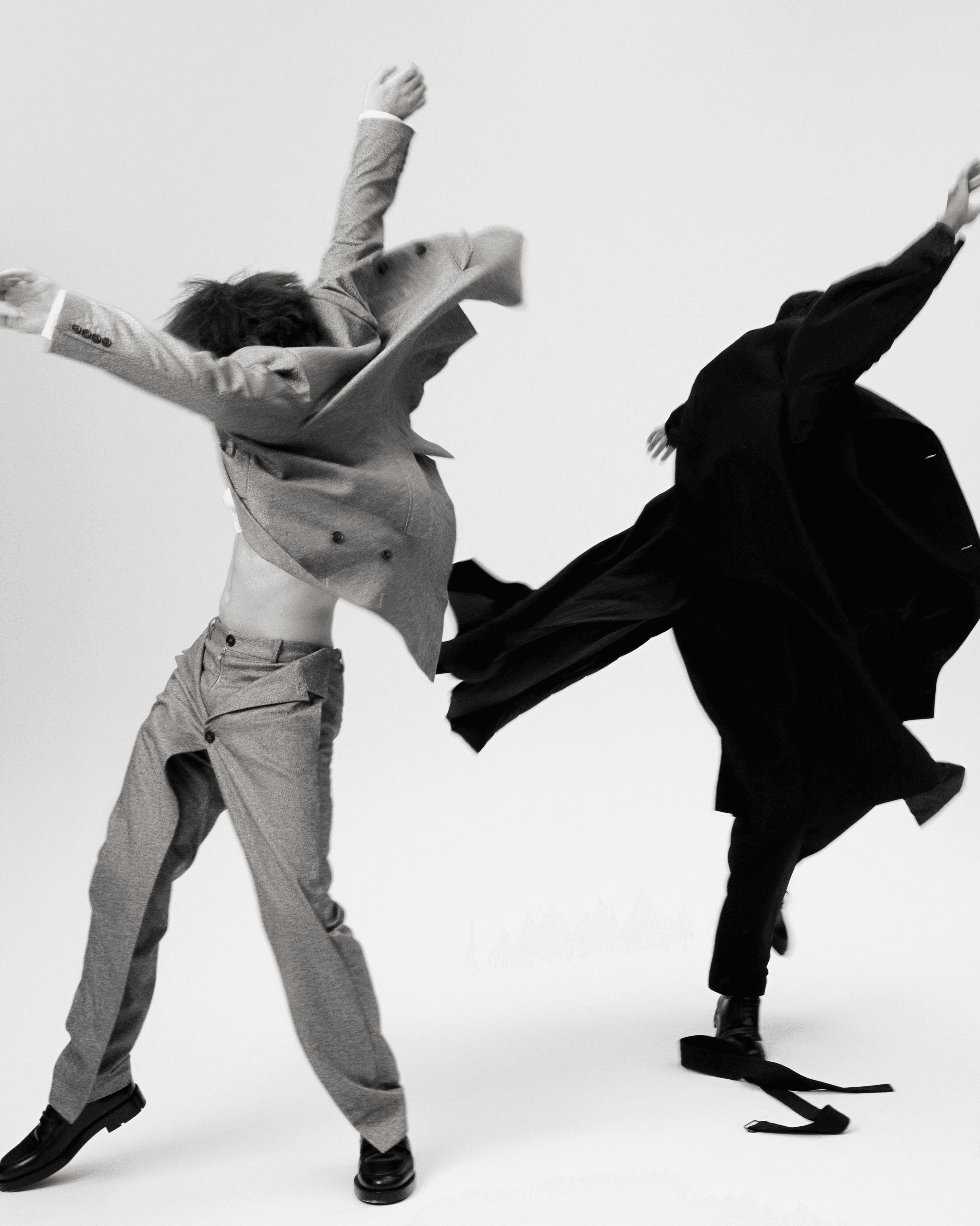 FROM LEFT: Gabriel wears all CLOTHING by KYLE’LYK; SHOES by Zegna. Chamblee wears all CLOTHING by IM Men; SHOES by Louis Vuitton.