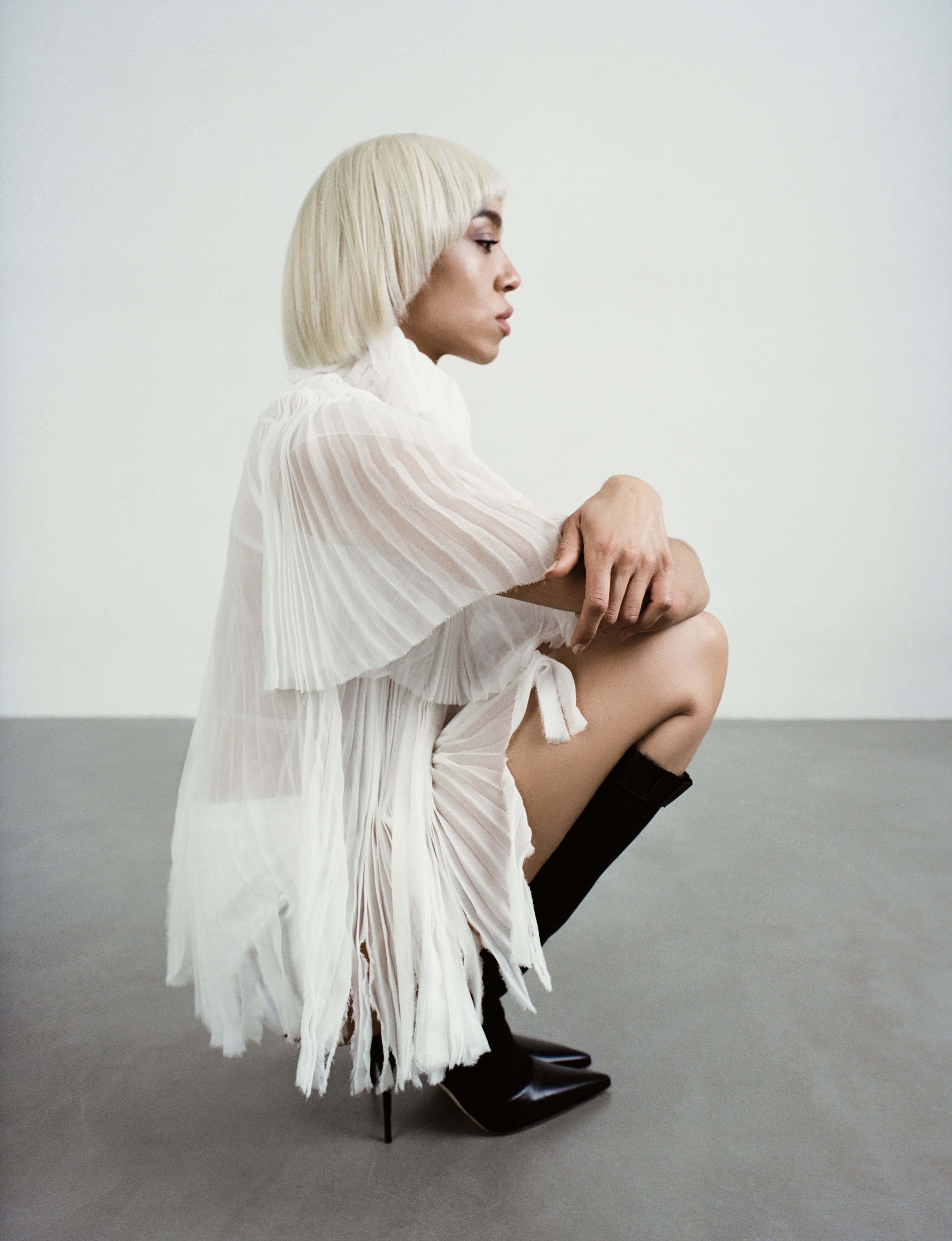 SHIRT by McQueen; SHORTS by Cou Cou Intimates; SHOES by Manolo Blahnik