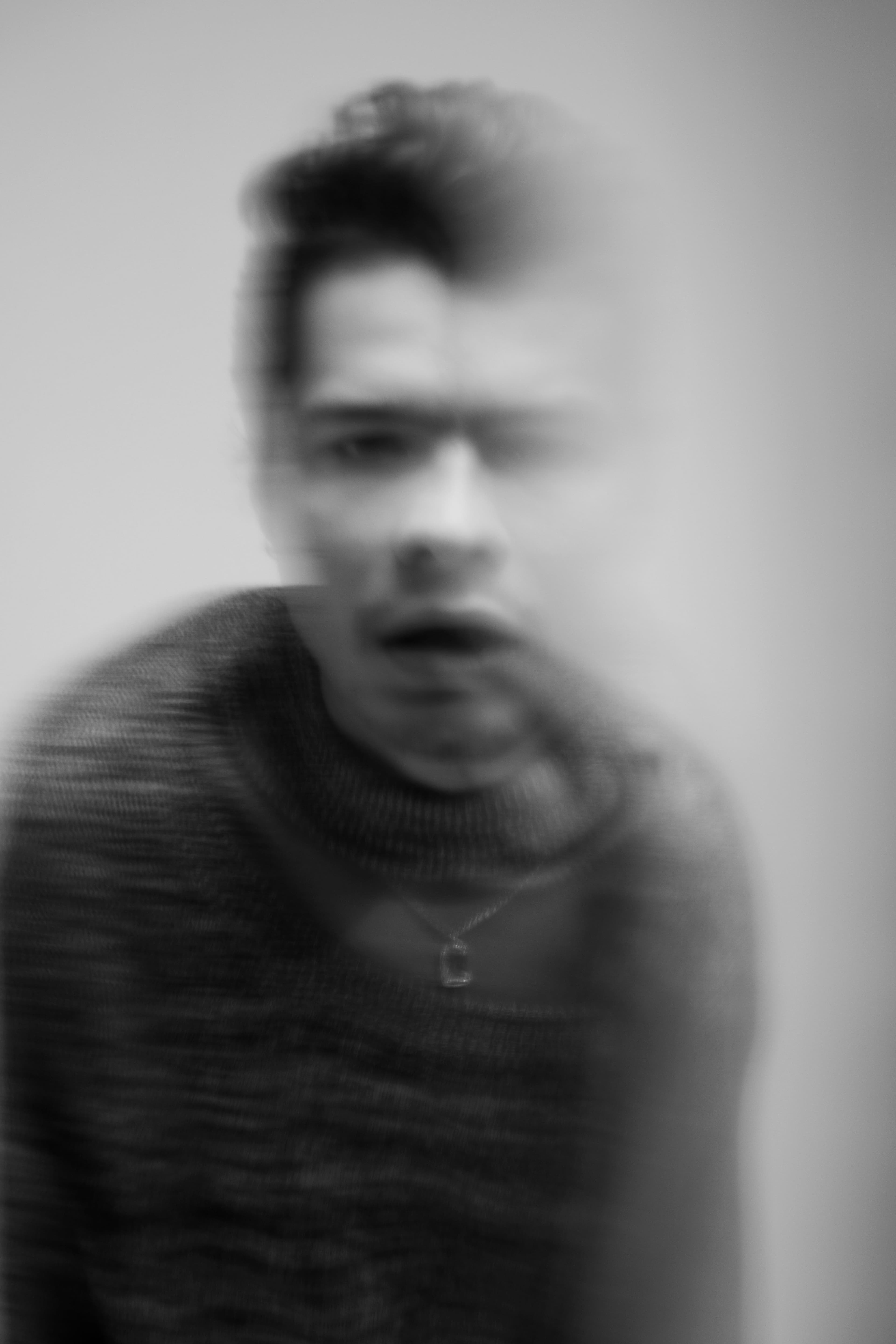 Sweater by Y/Project. Necklace by Bleue Burnham.