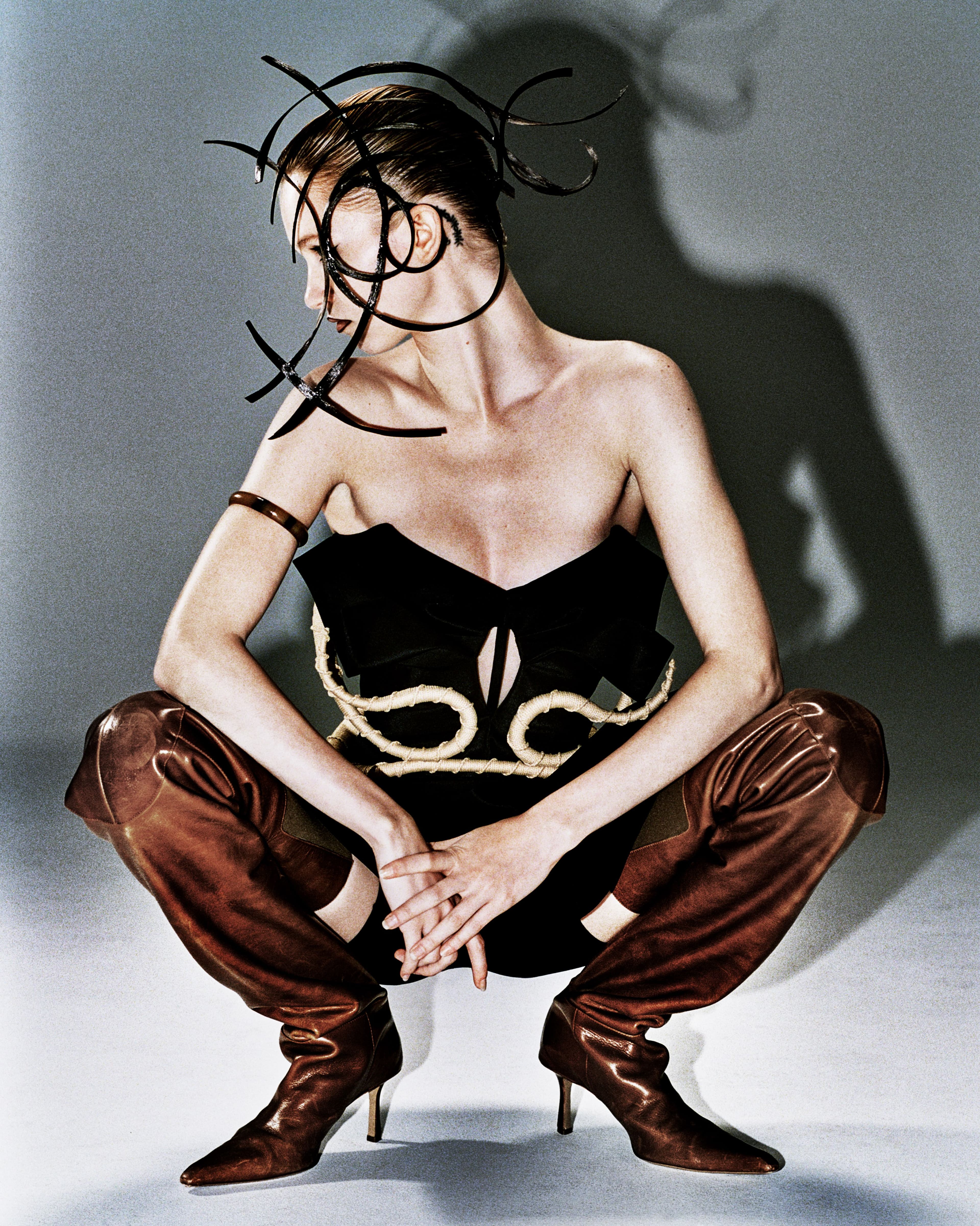 TOP by McQueen; BELT by LIVIDO; BOOTS by Y/Project