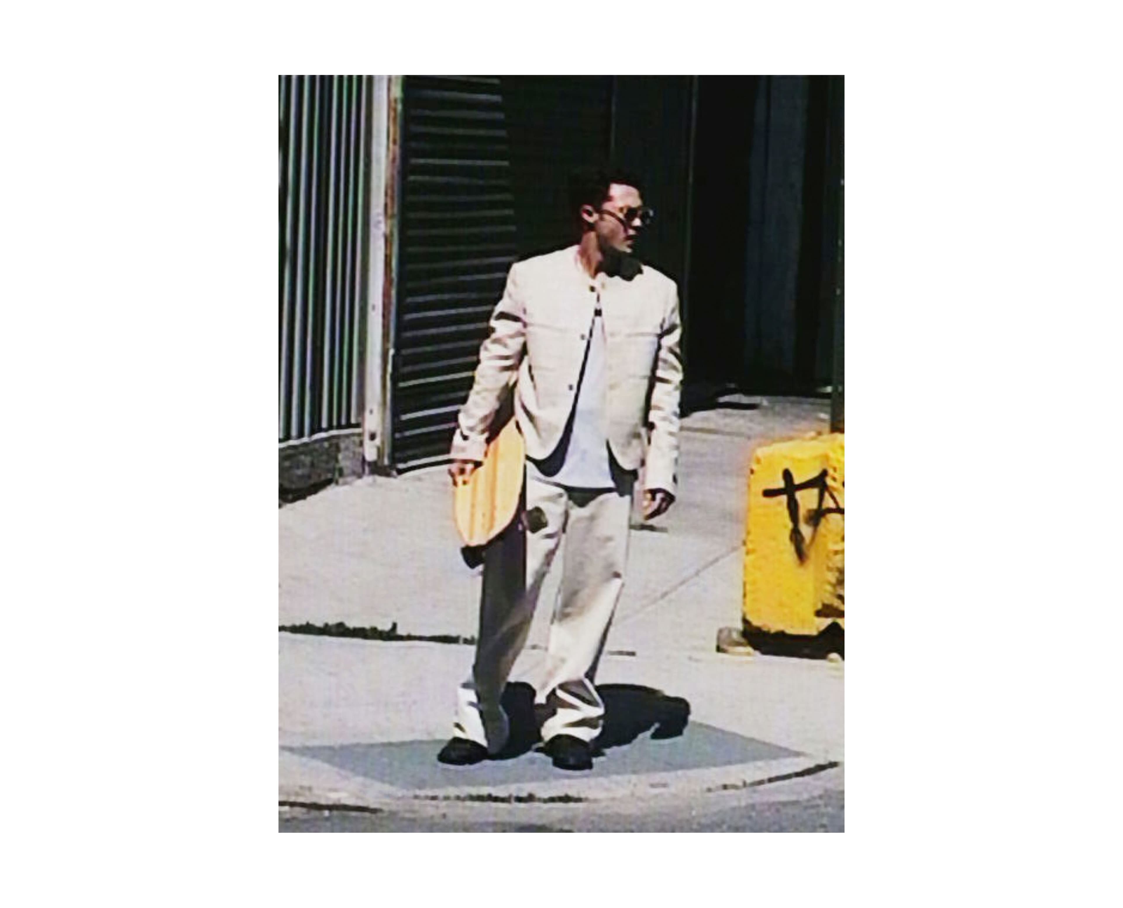 JACKET, PANTS, and SHOES by Louis Vuitton; TOP by Emporio Armani