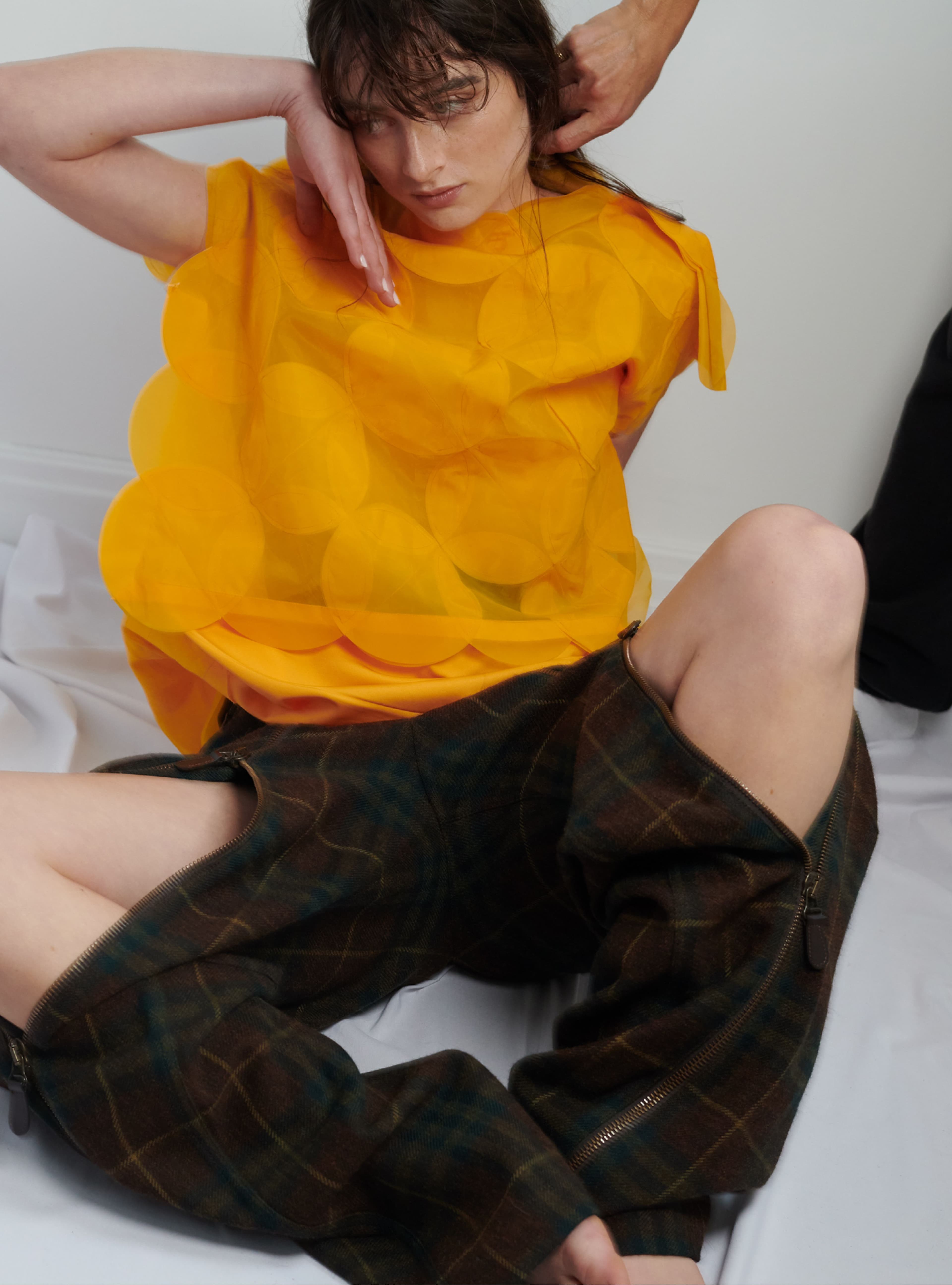 Vintage TOP by ,Comme des Garçons, from Rellik. PANTS by ,Burberry.