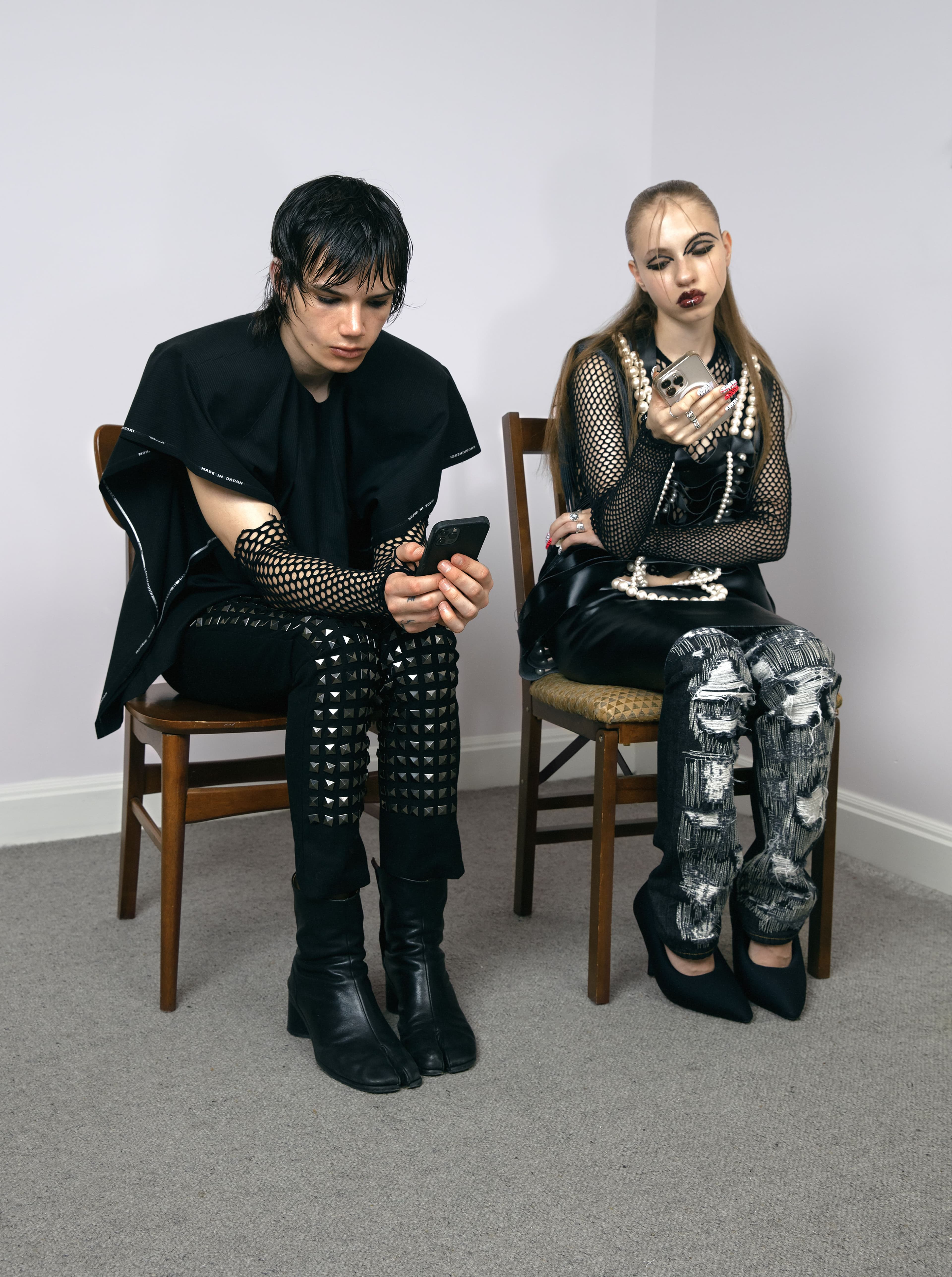 From left: Jeffrey wears all clothing by Junya Watanabe. Boots by Maison Margiela. Gloves, stylist’s own. Payne wears all clothing by Junya Watanabe. Shoes by Balenciaga.