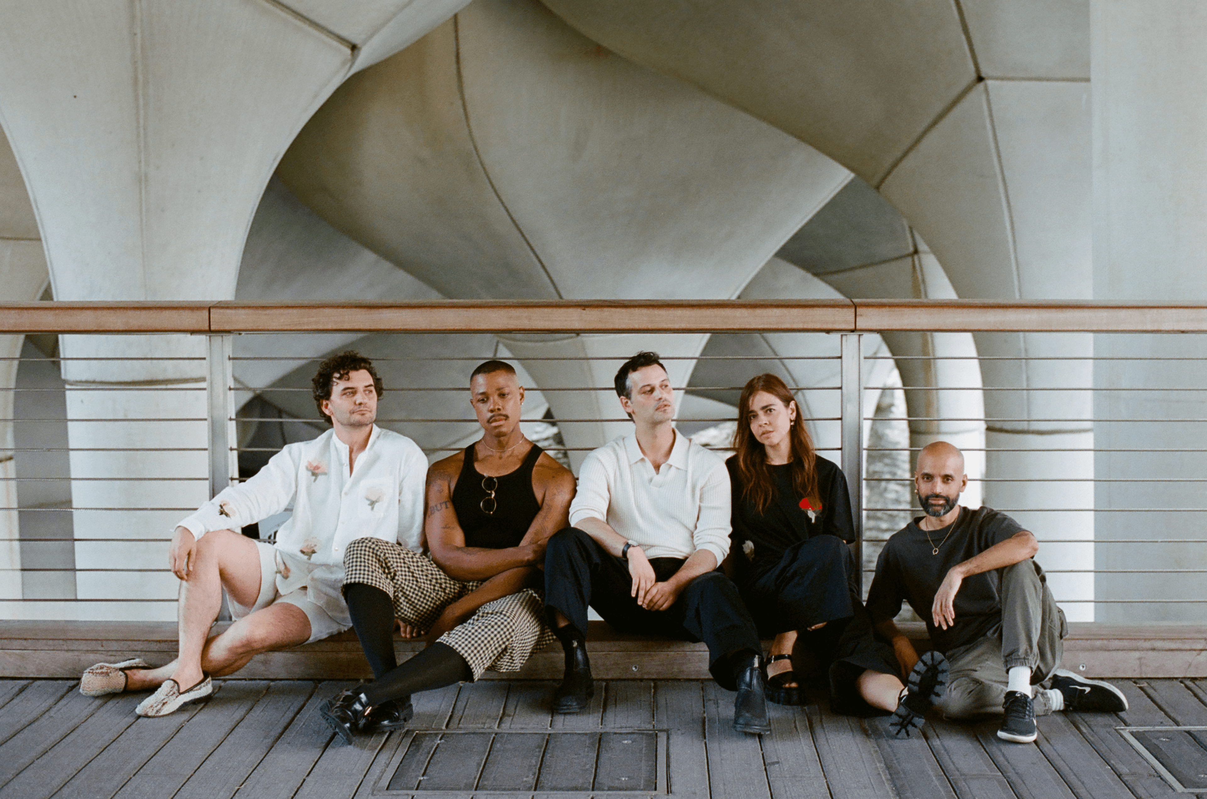 FROM LEFT: Dustin Wills wears SHIRT by ,Considered Objects. ,SHORTS and SHOES, Wills’s own. Davóne Tines. Winokur wears SWEATER by ,Todd Snyder., PANTS by ,Maison Margiela., Emma Ramos wears T-SHIRT by ,Considered Objects., PANTS, SHOES, and EARRINGS, Ramos’s own. Misha Chowdhury.