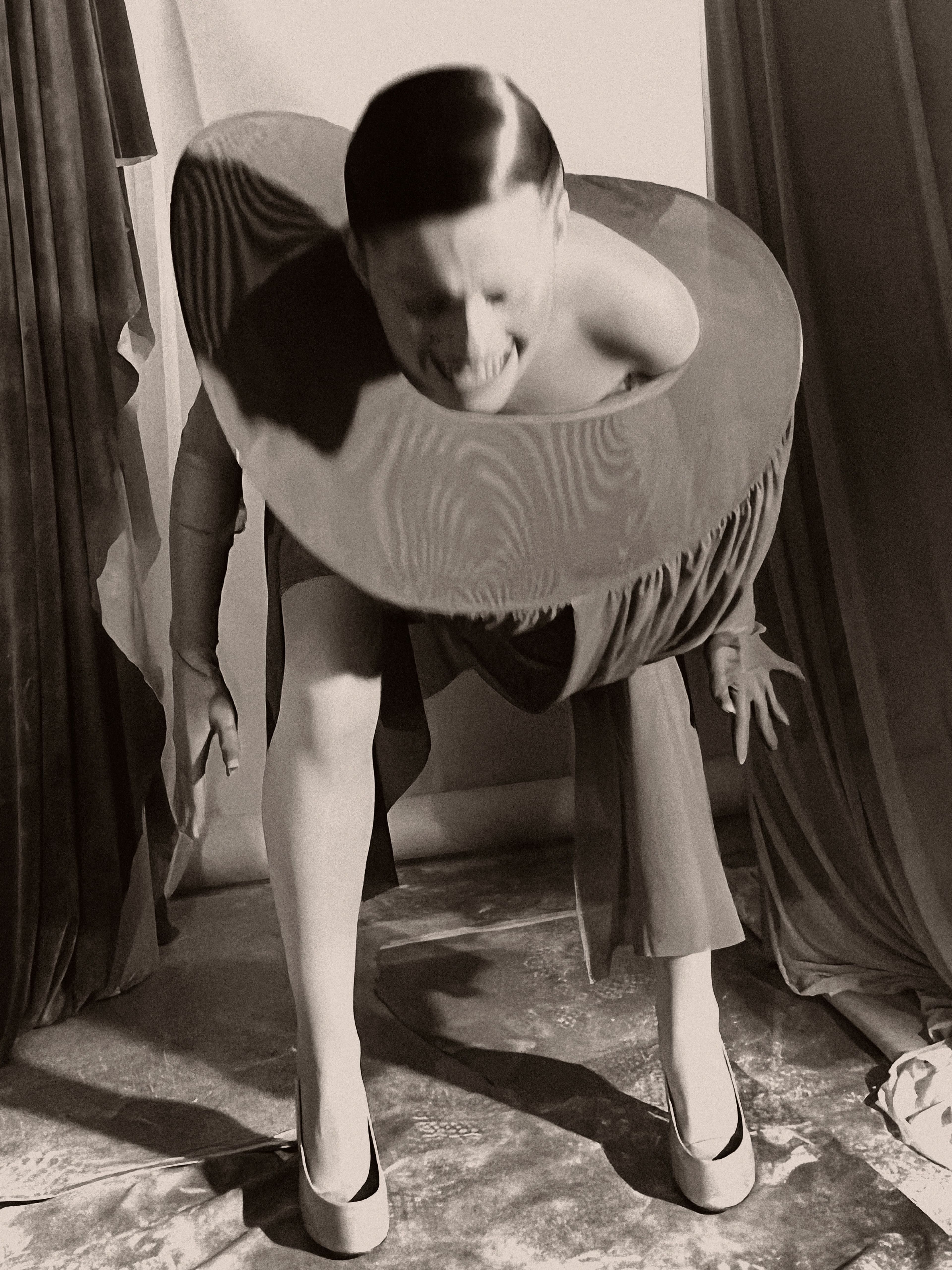 Dress by Jisoo Baik. Tights by Falke. Vintage shoes by Martin Margiela from Passage Contemporain.