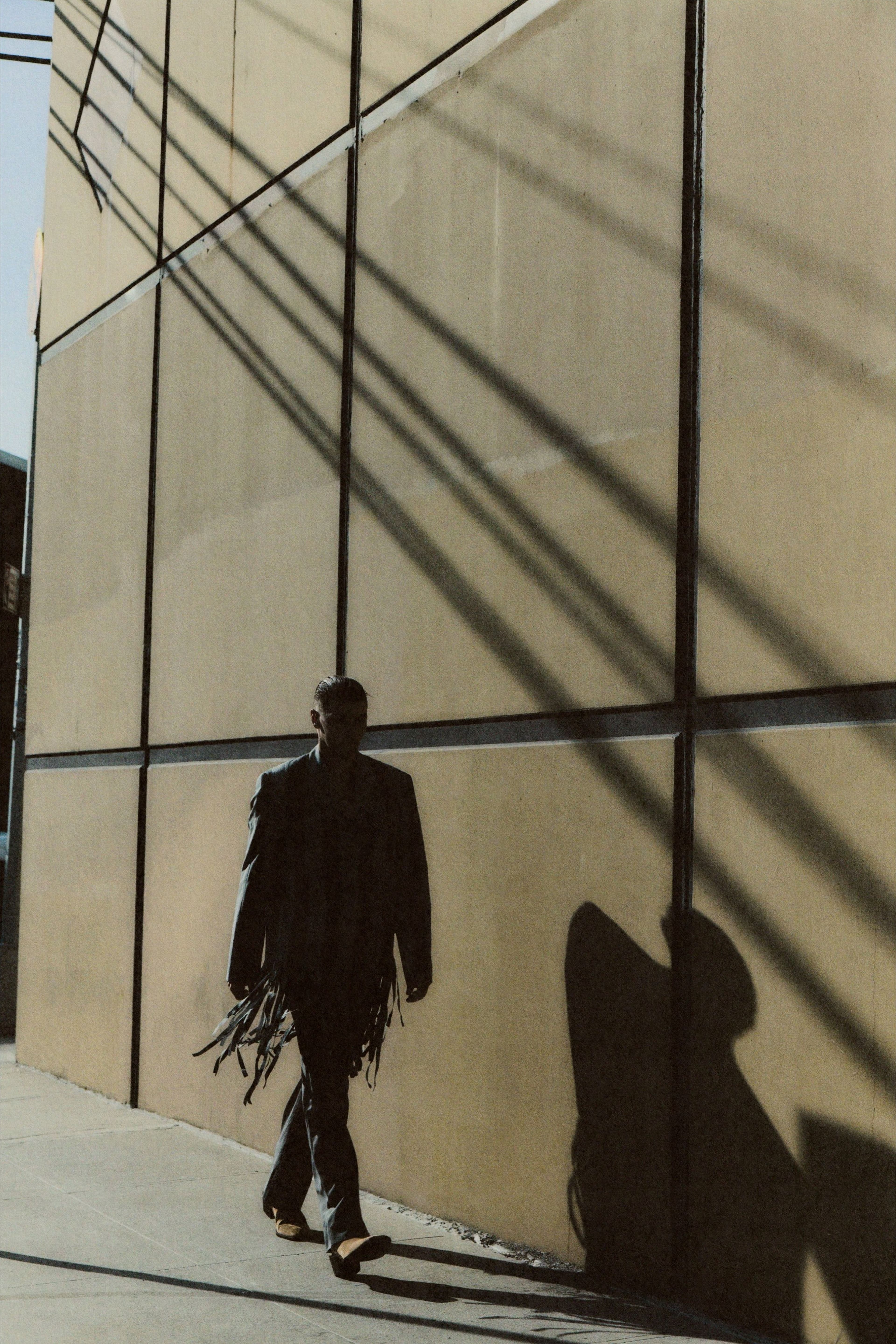 All CLOTHING by ,Moschino., SHOES by ,Versace.