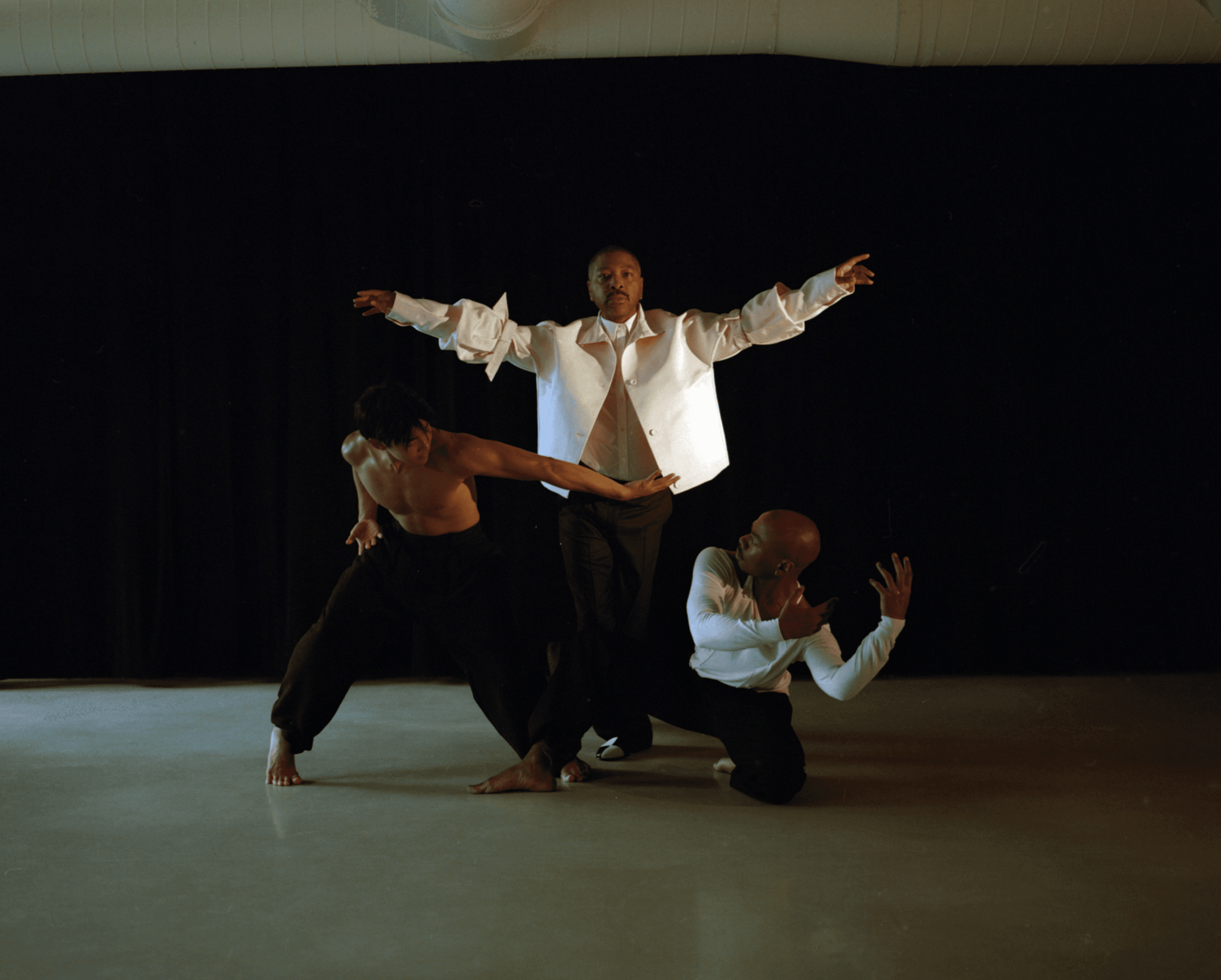 FROM LEFT: Okajima wears PANTS by Ferragamo. Abraham wears JACKET and PANTS by Dior; SHIRT by Dries Van Noten; SHOES by Manolo Blahnik. Bowman wears TOP by Dior,; ,PANTS by Dries Van Noten,.