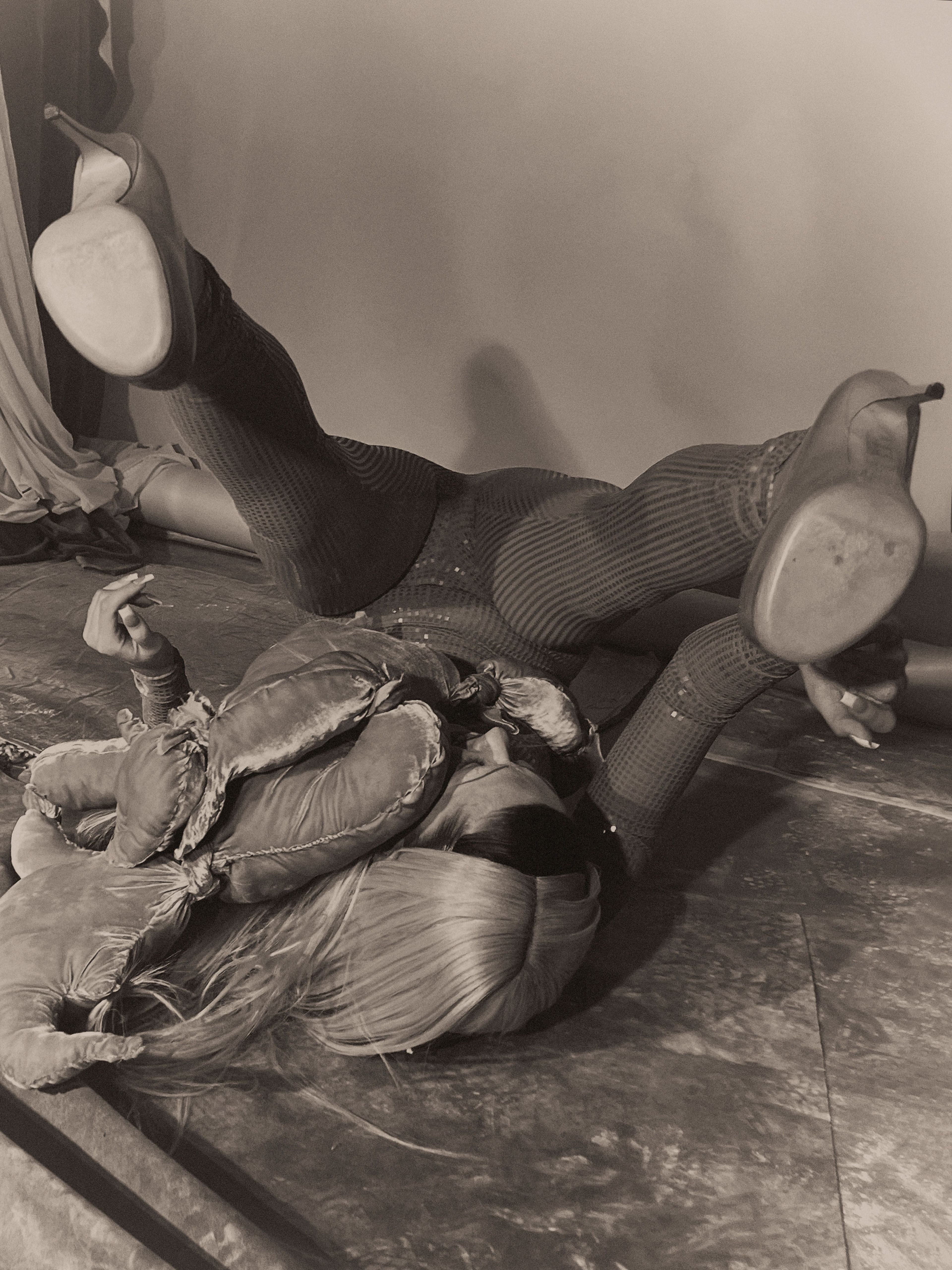 Top and pants by AZ Factory. Vintage shoes by Martin Margiela from Passage Contemporain.. 
Sculpture: ,Velvet Knight,, Julian Farade, 2022